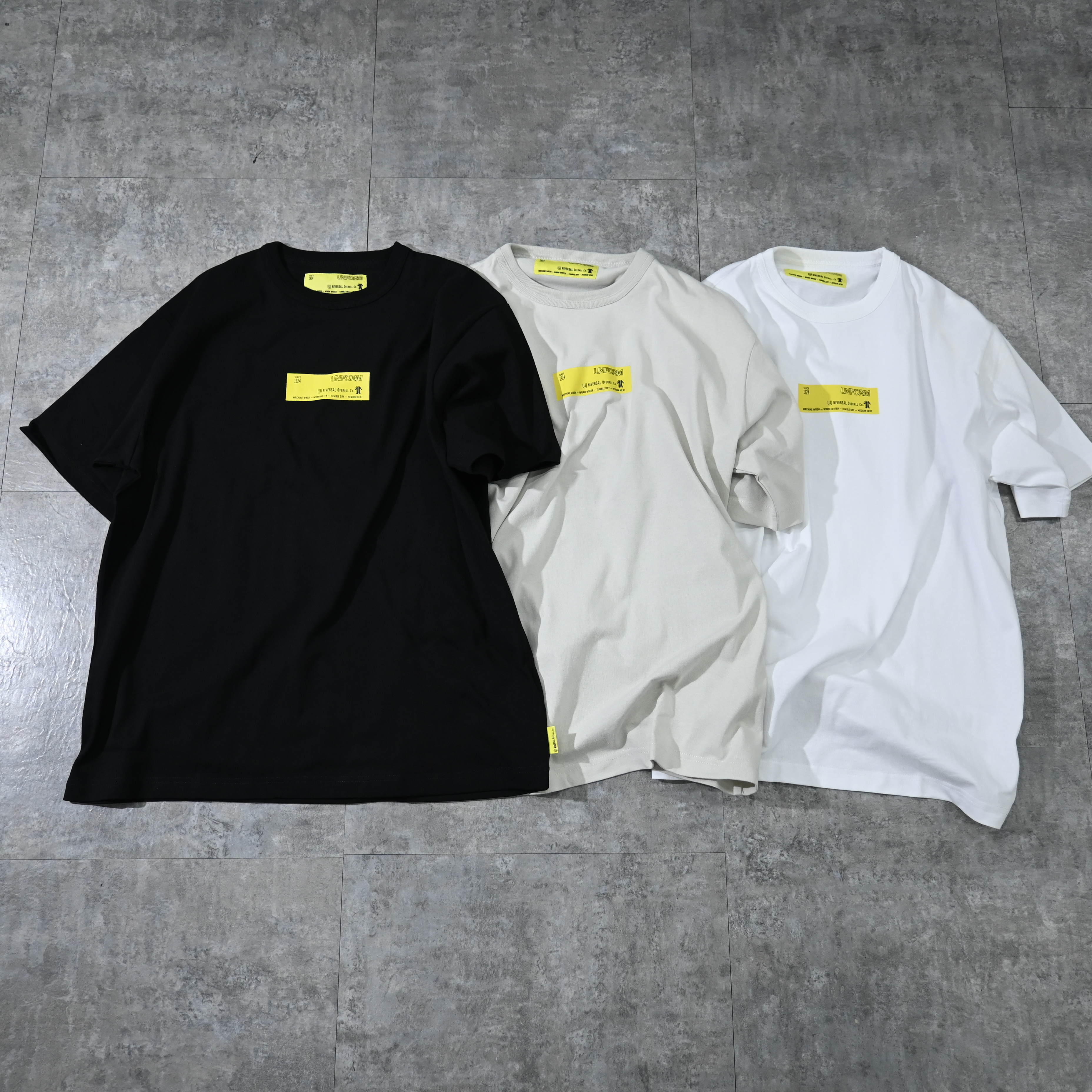 Universal Overall Print Logo Tee
