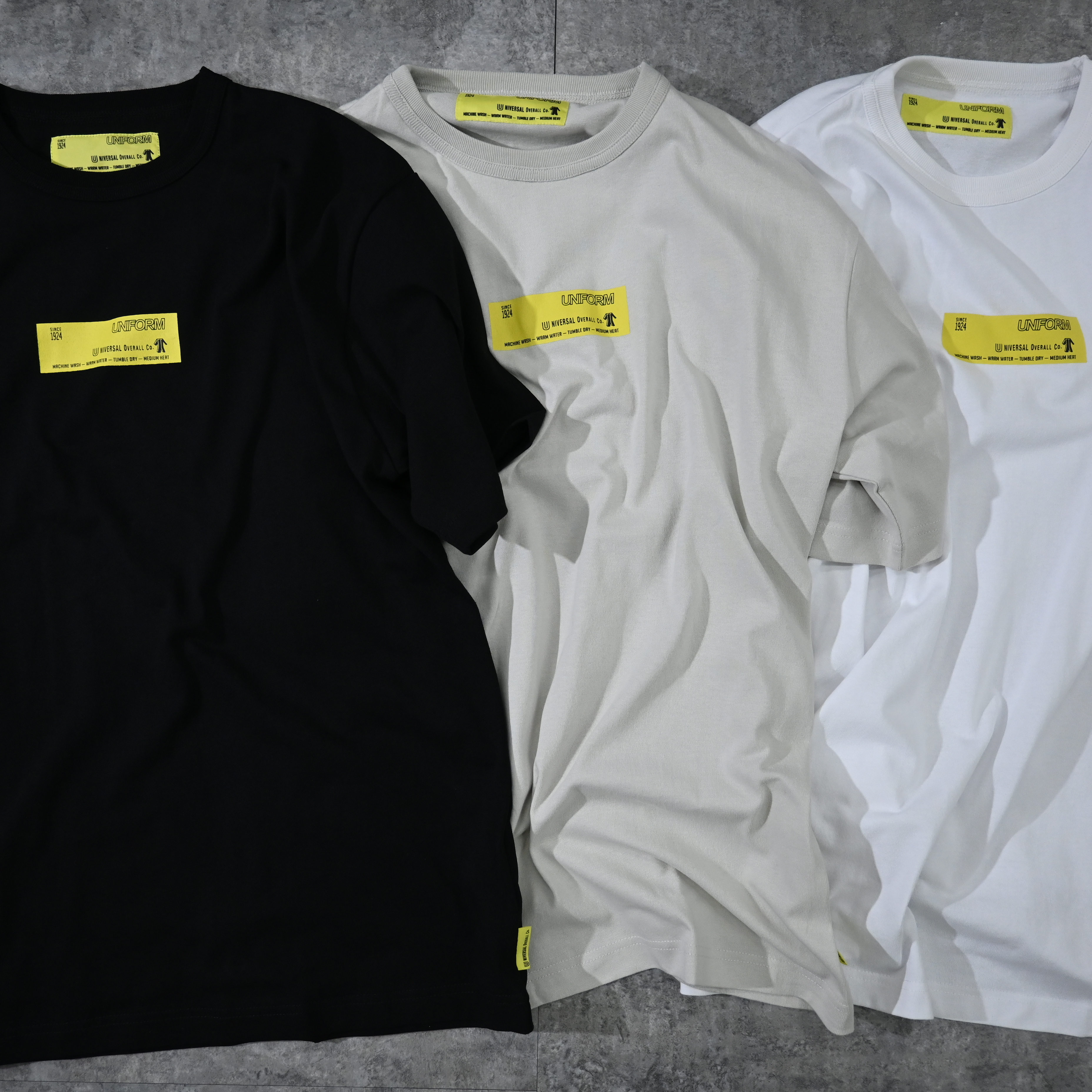 Universal Overall Print Logo Tee