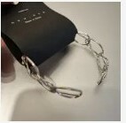 [S] NYU.NYU INTERTWINED BANGLE,SILVER, SNN181 (SNN181)