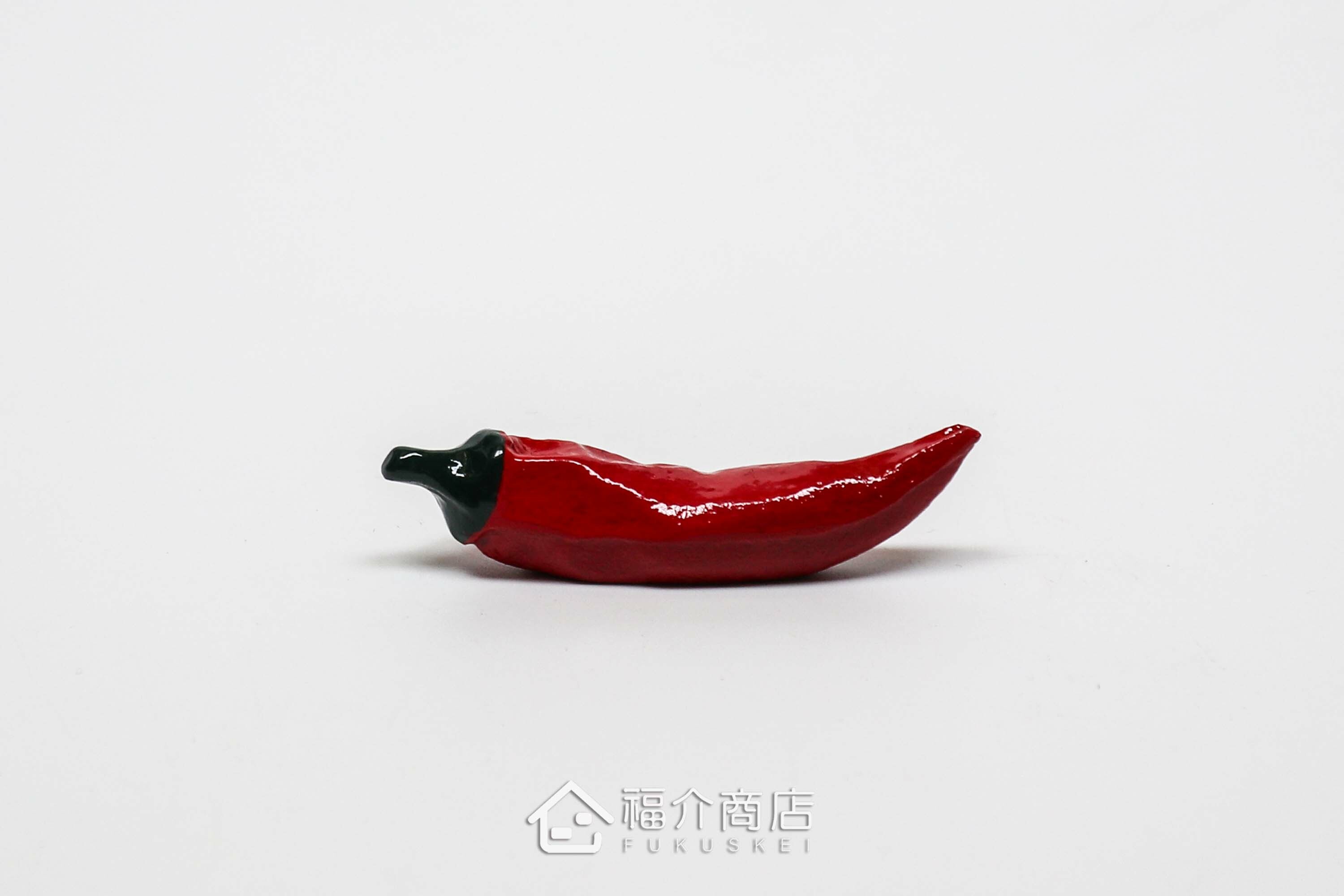 放置筷子用的紅色辣椒造型筷架
