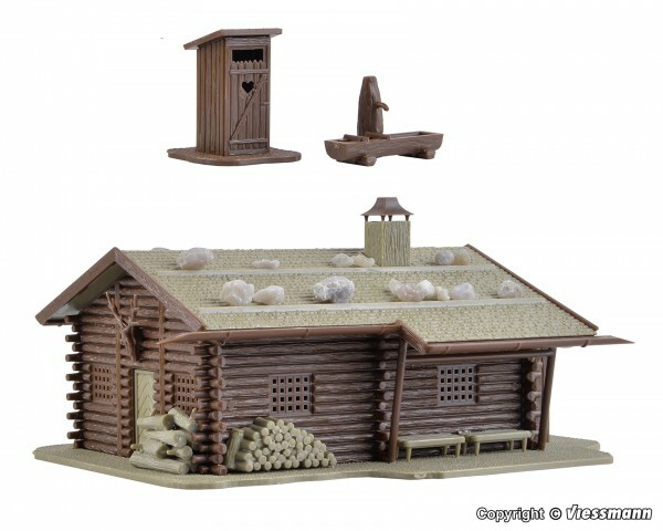 Vollmer 43708 HO-scale Hunting lodge with fountain and outhouse