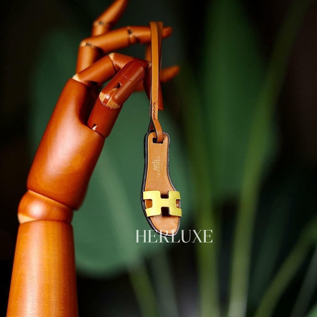 Sac Oran Nano charm 9R lime/ 21 natural sable/ 89 noir