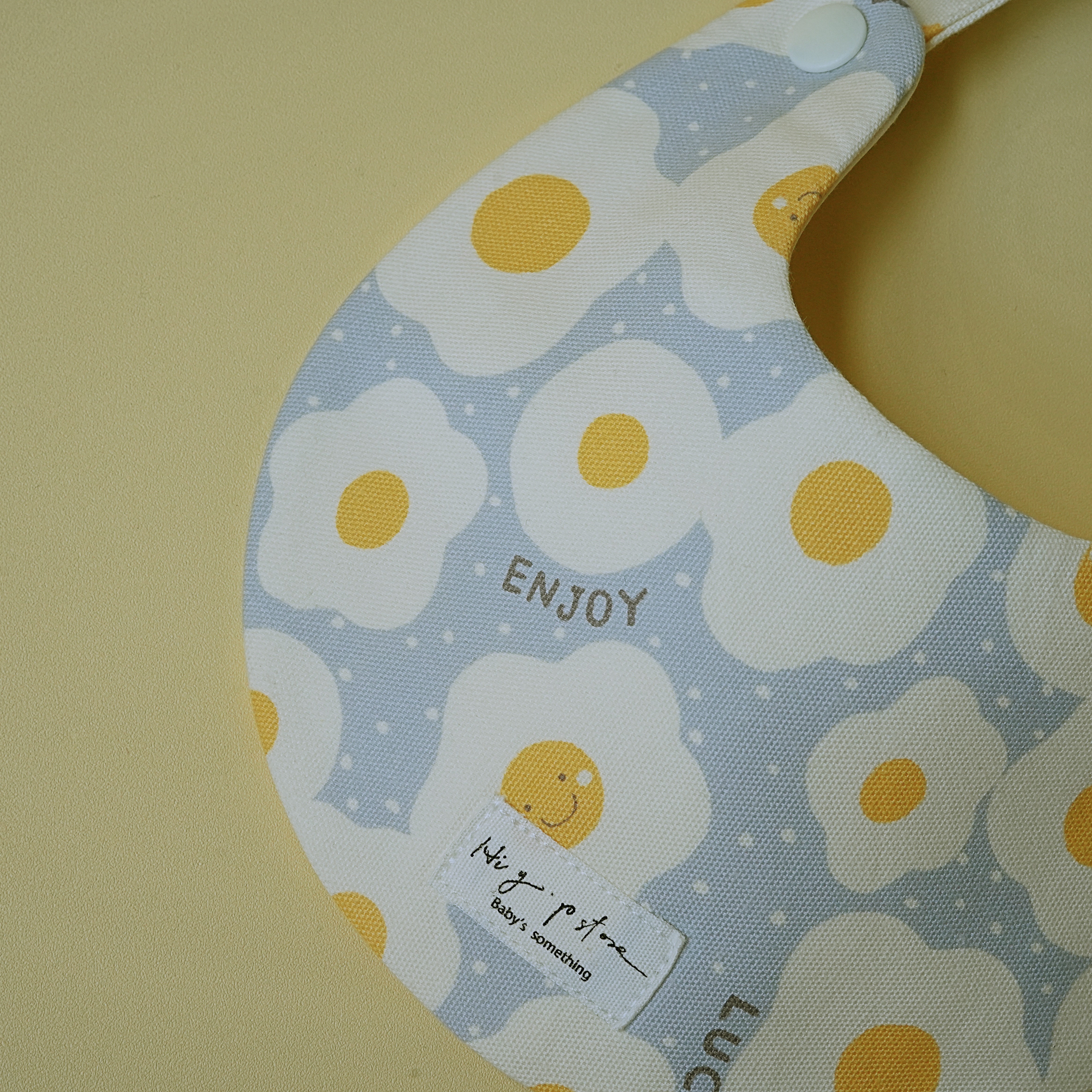 Hi Y.P store-手作圍兜-藍色微笑荷包蛋