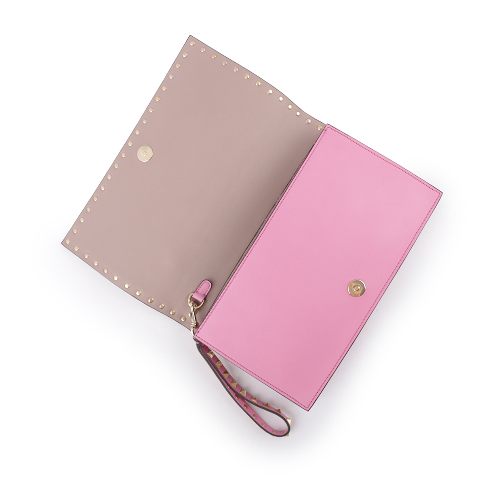 【VALENTINO】小牛皮鉚釘附提把手拿包(粉色) IW2B0399NBD N50