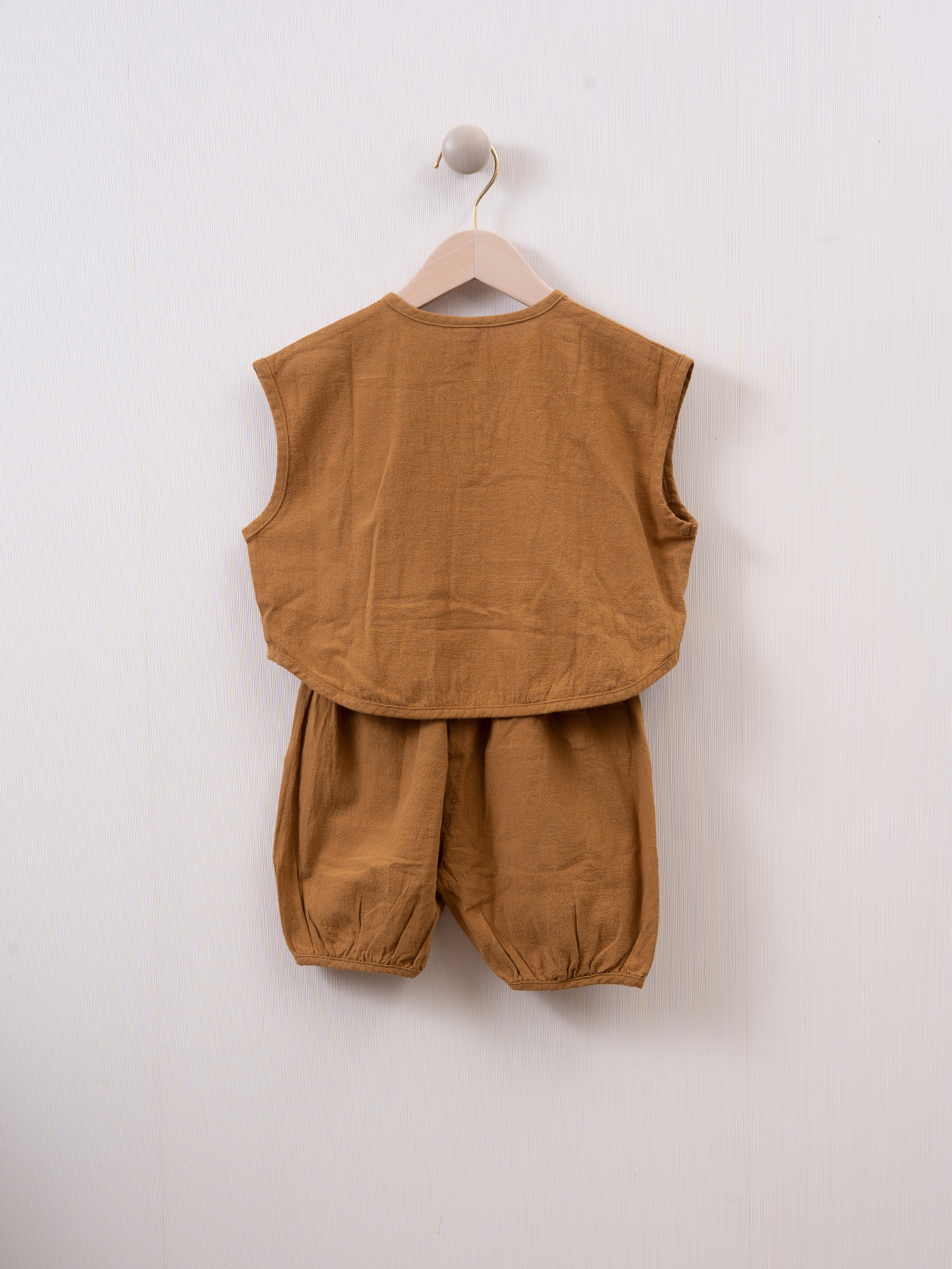 mila's 口袋背心套裝