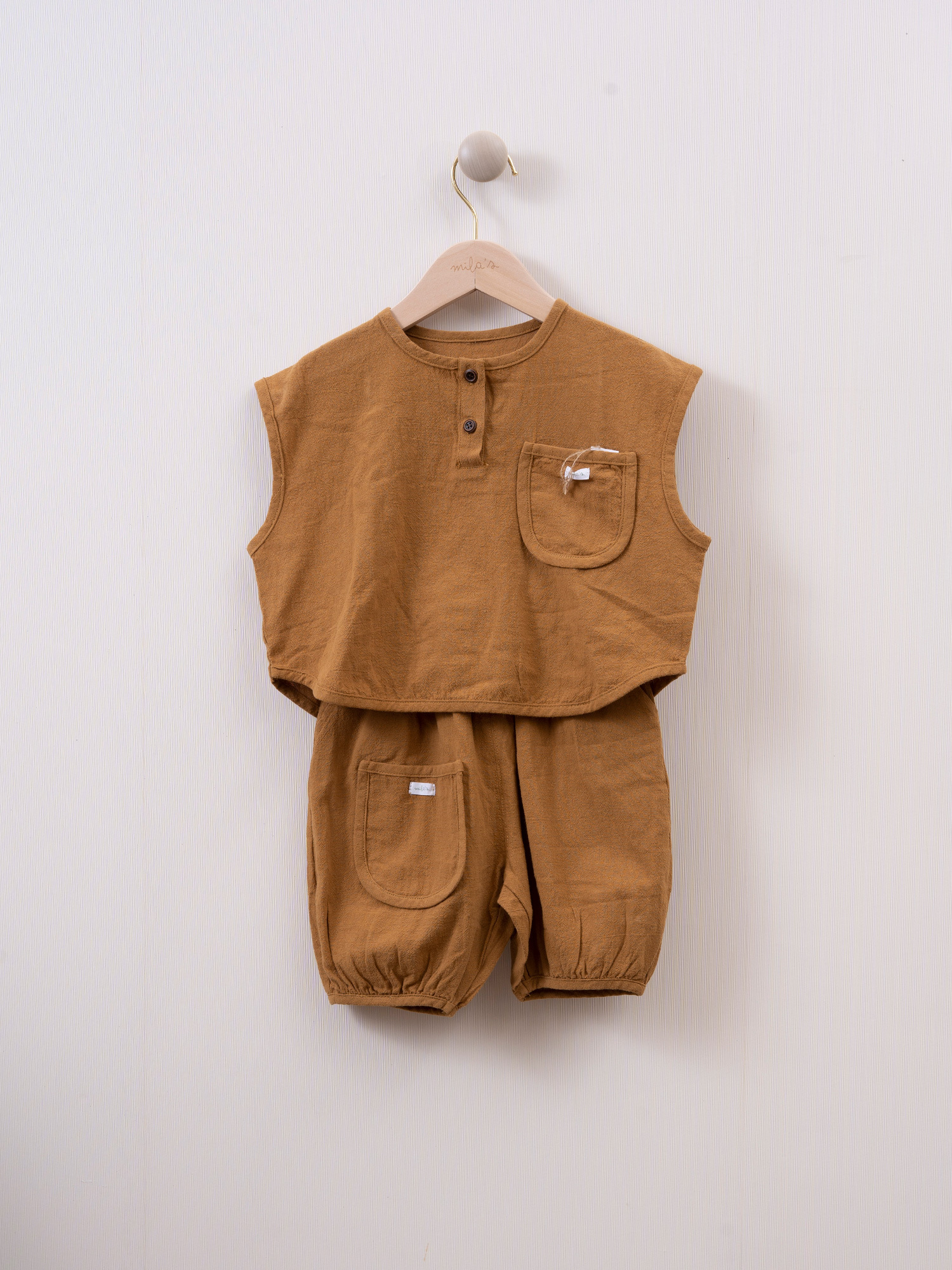 mila's 口袋背心套裝