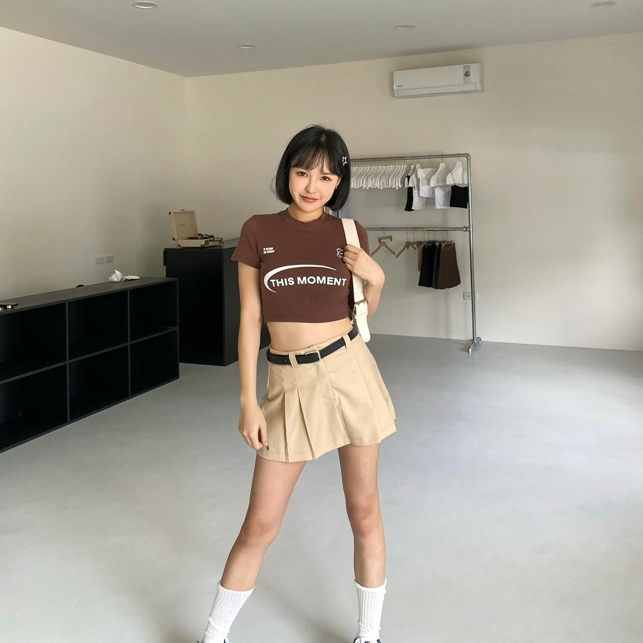 歐美學院風皮帶壓摺短裙