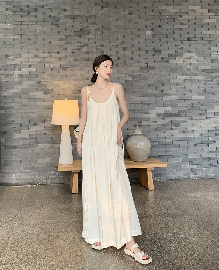 穿繩大露背 渡假長洋