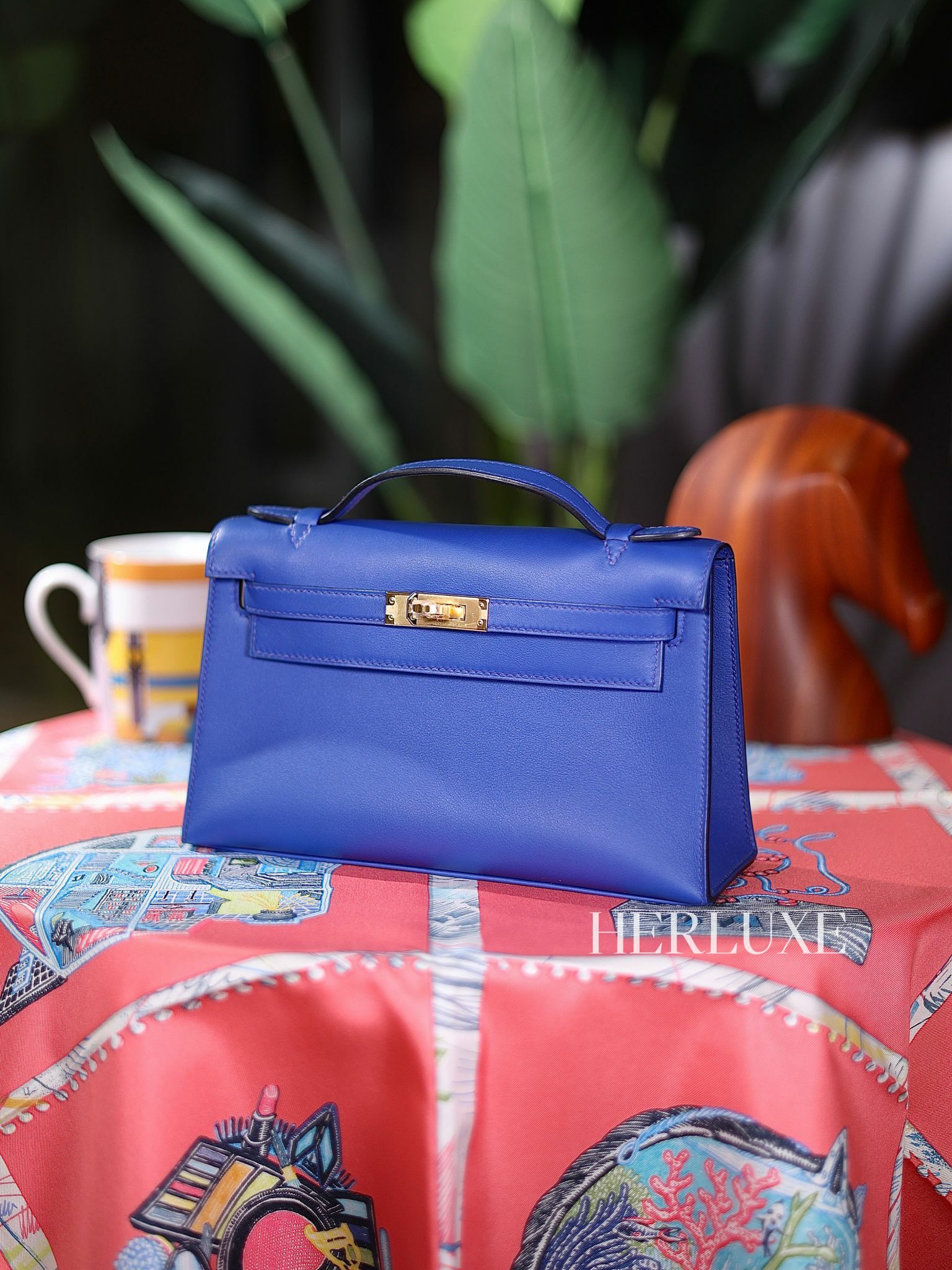 Kelly pochette O8 bleu royal cc swift W
