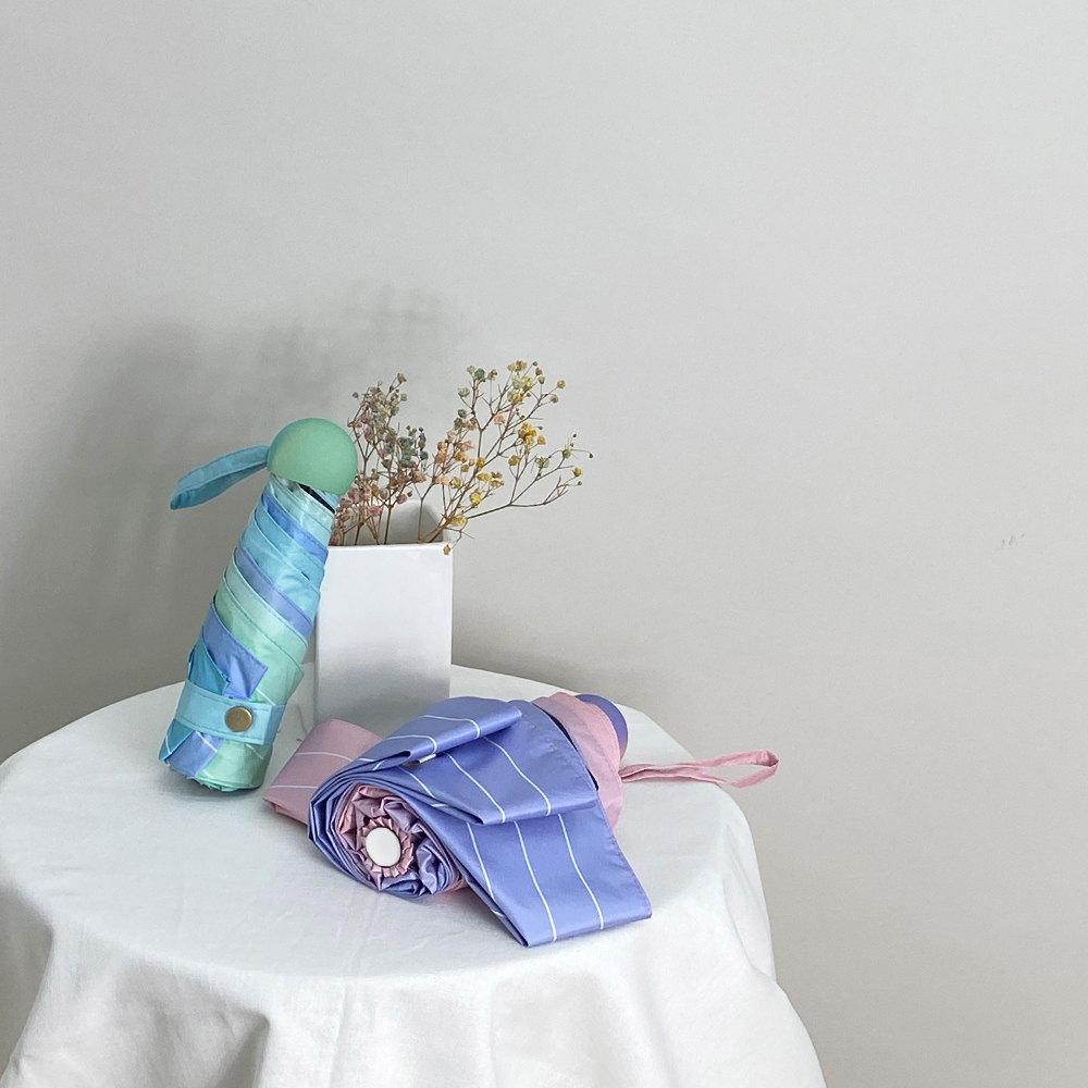 雨之情口袋傘撐出優雅氣質,漸層顏色獨特設計,雨天氣出門撐起雨傘