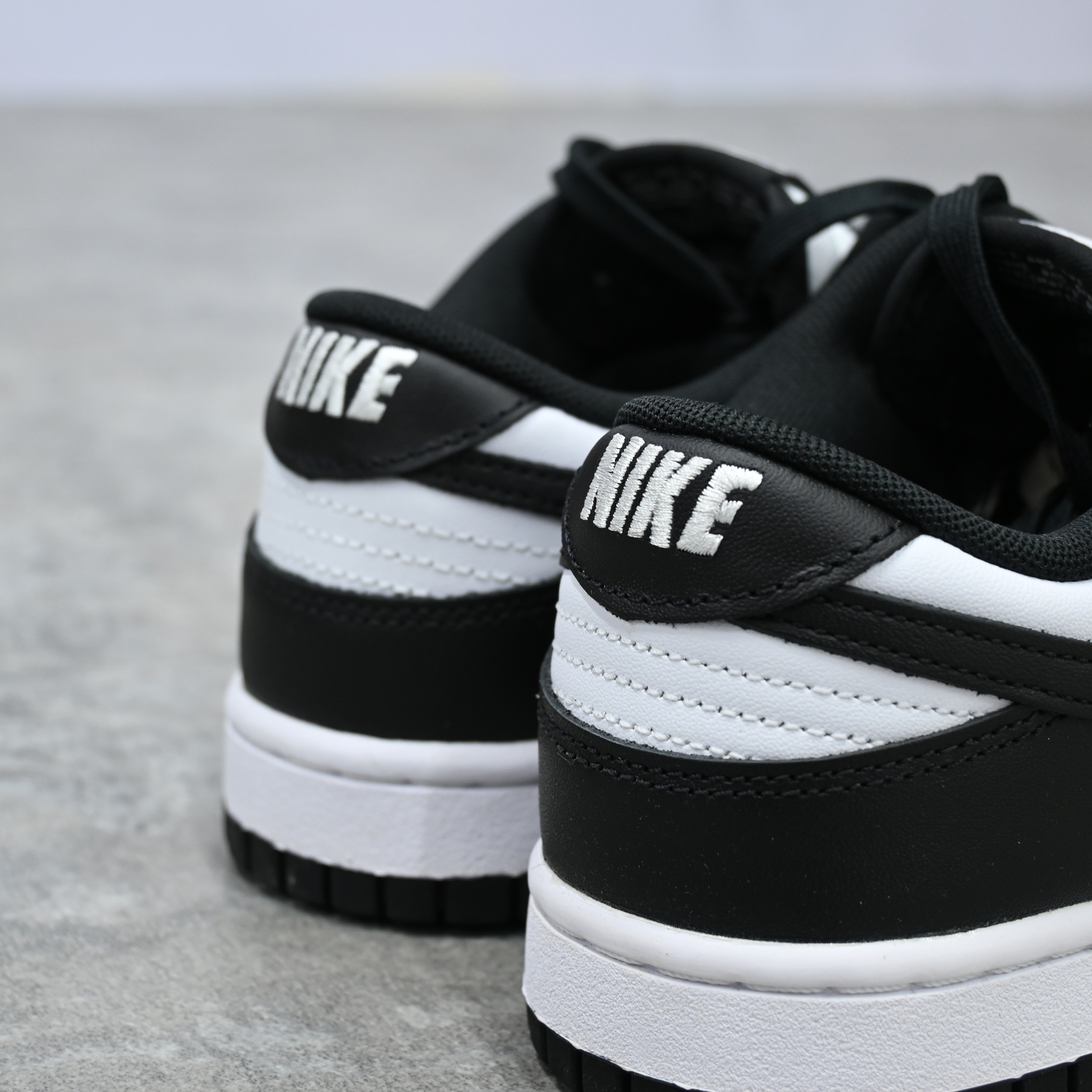 black and white nike low top
