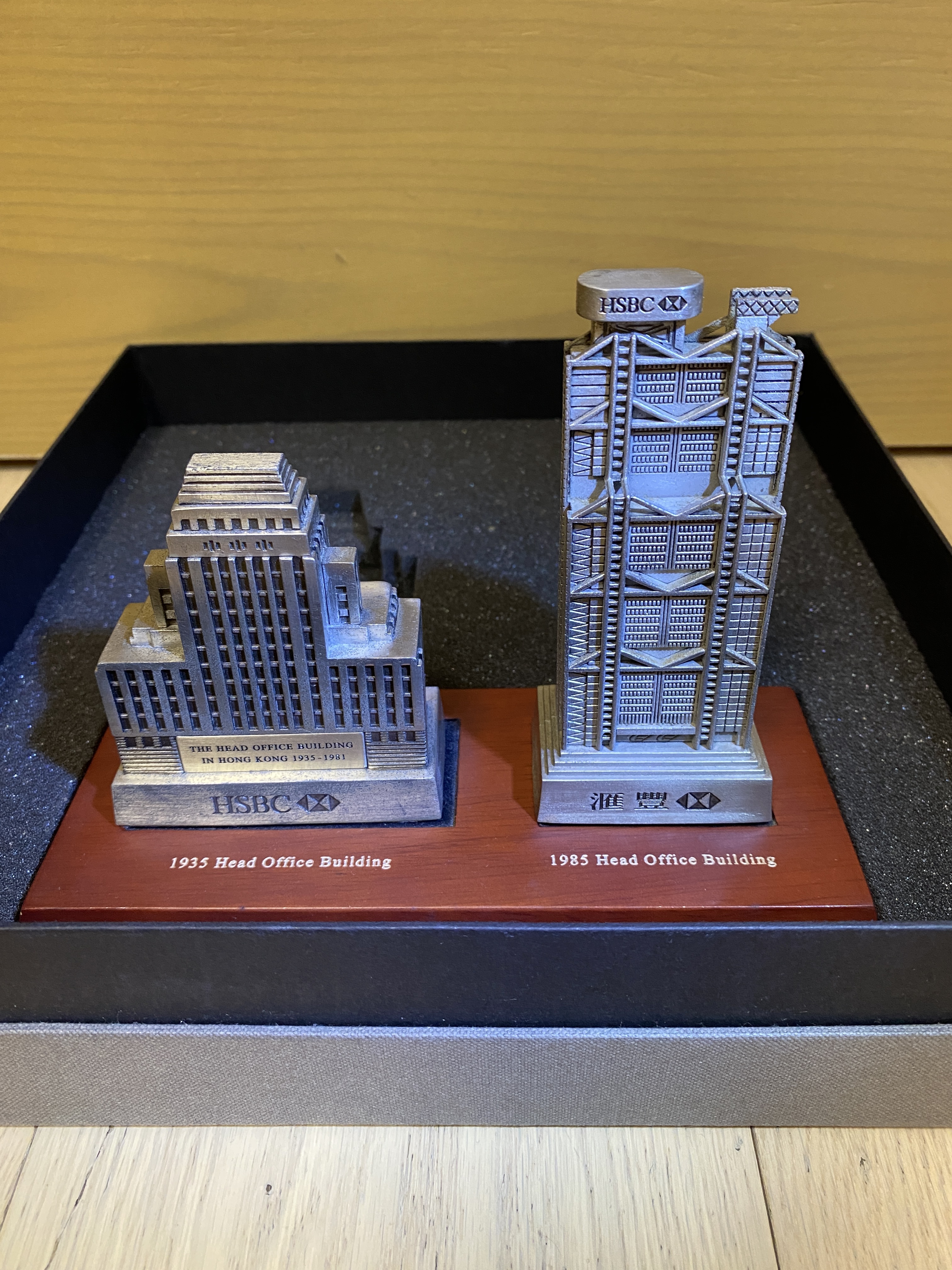 HSBC bank paperweight set including the new and old HSBC buildings