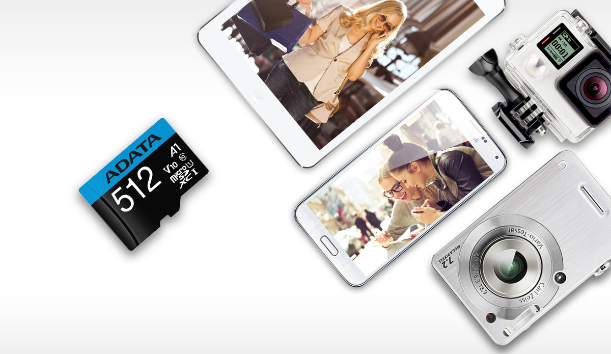 512G的威剛記憶卡正在和平版、手機、相機等多樣裝置一同擺在白色的桌面上