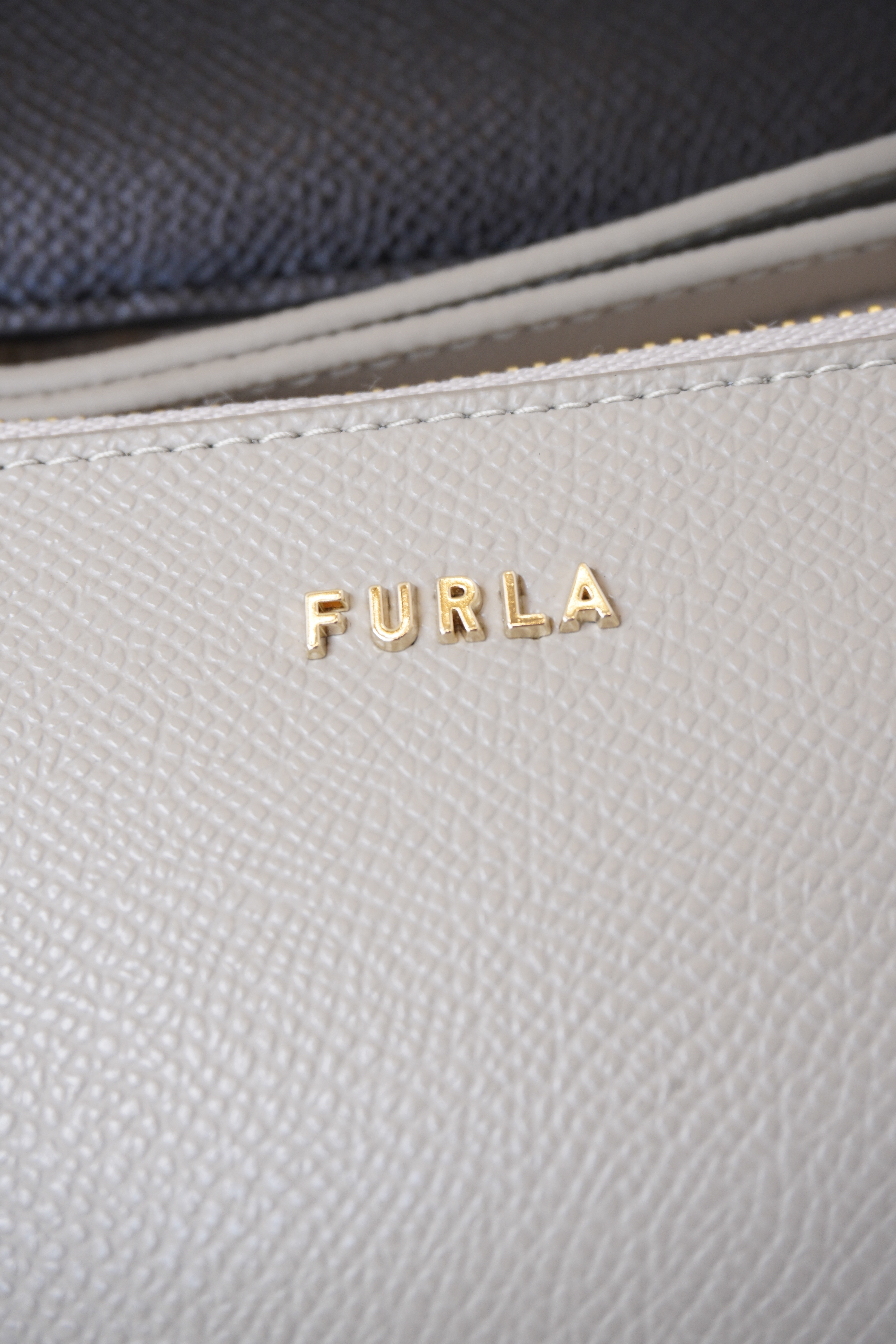 Furla pop logo classic slim wristlet