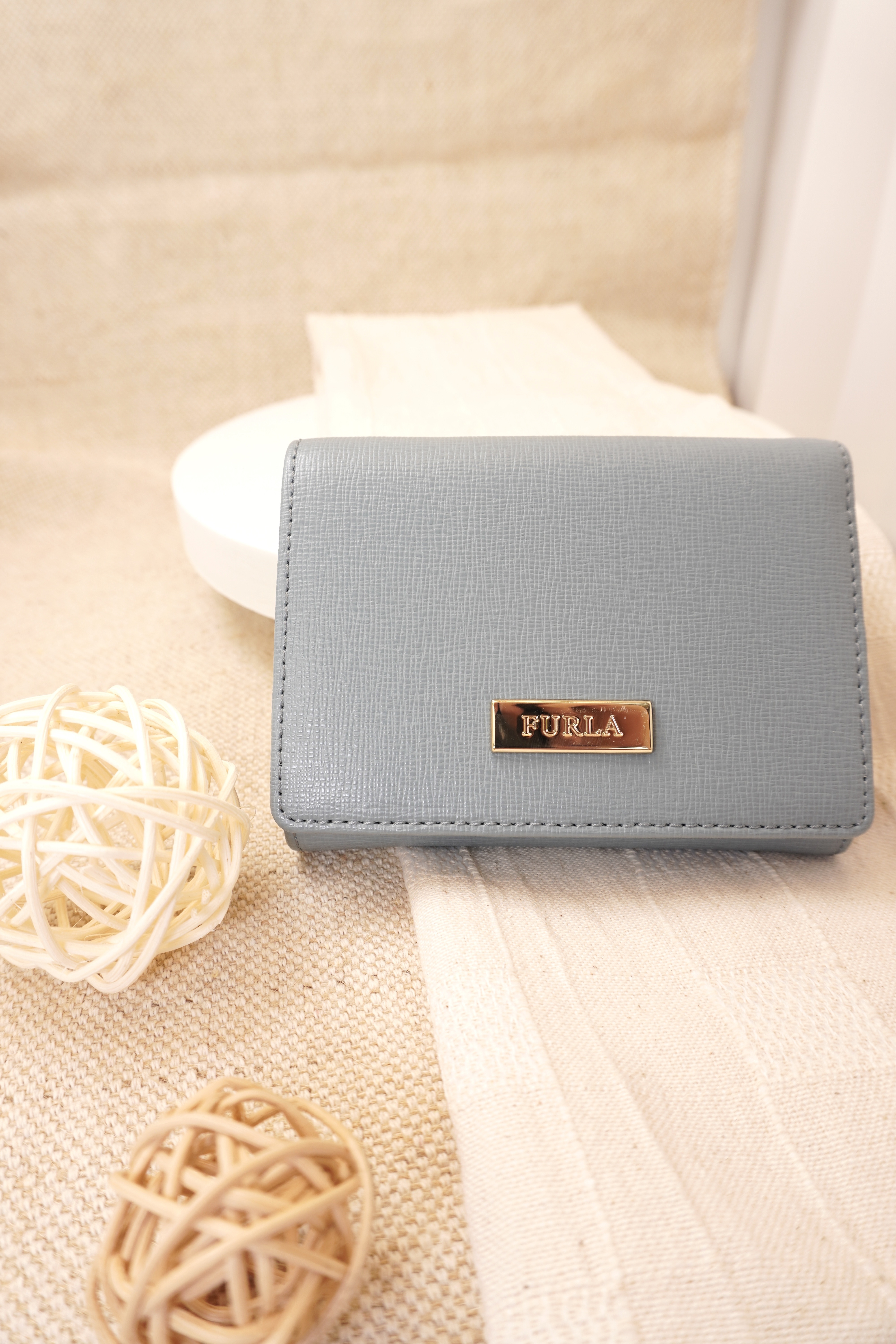 Furla trifold box logo