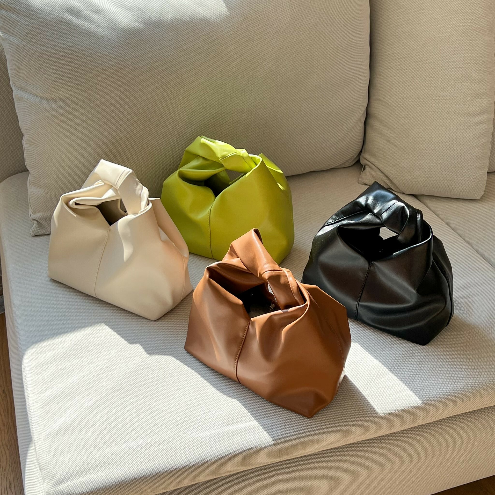 質感扭結雲朵餃子包/三色