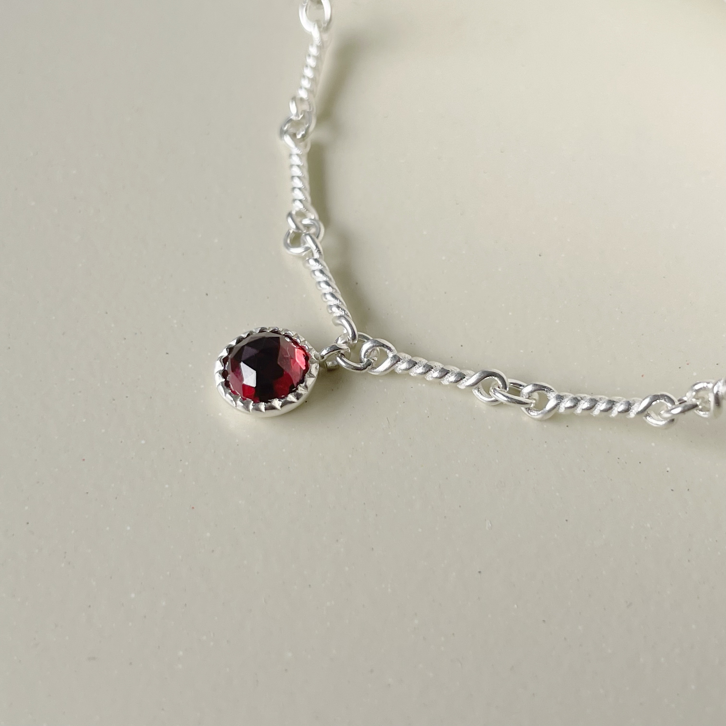 蛋糕石榴石twist節節手鍊