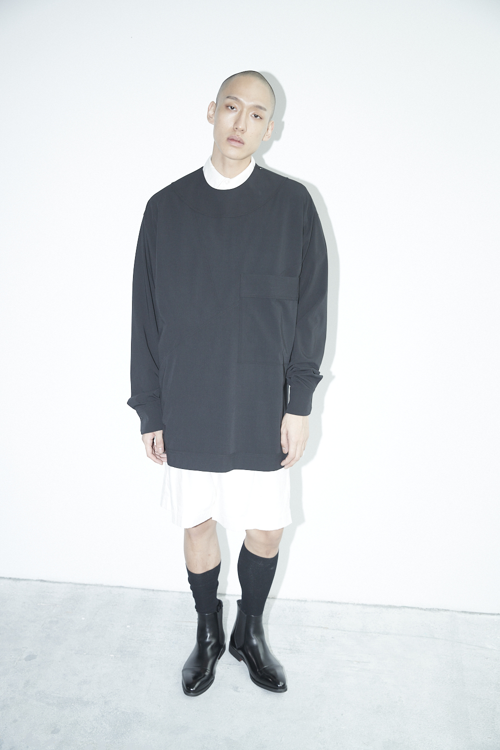 錯位剪接口袋上衣