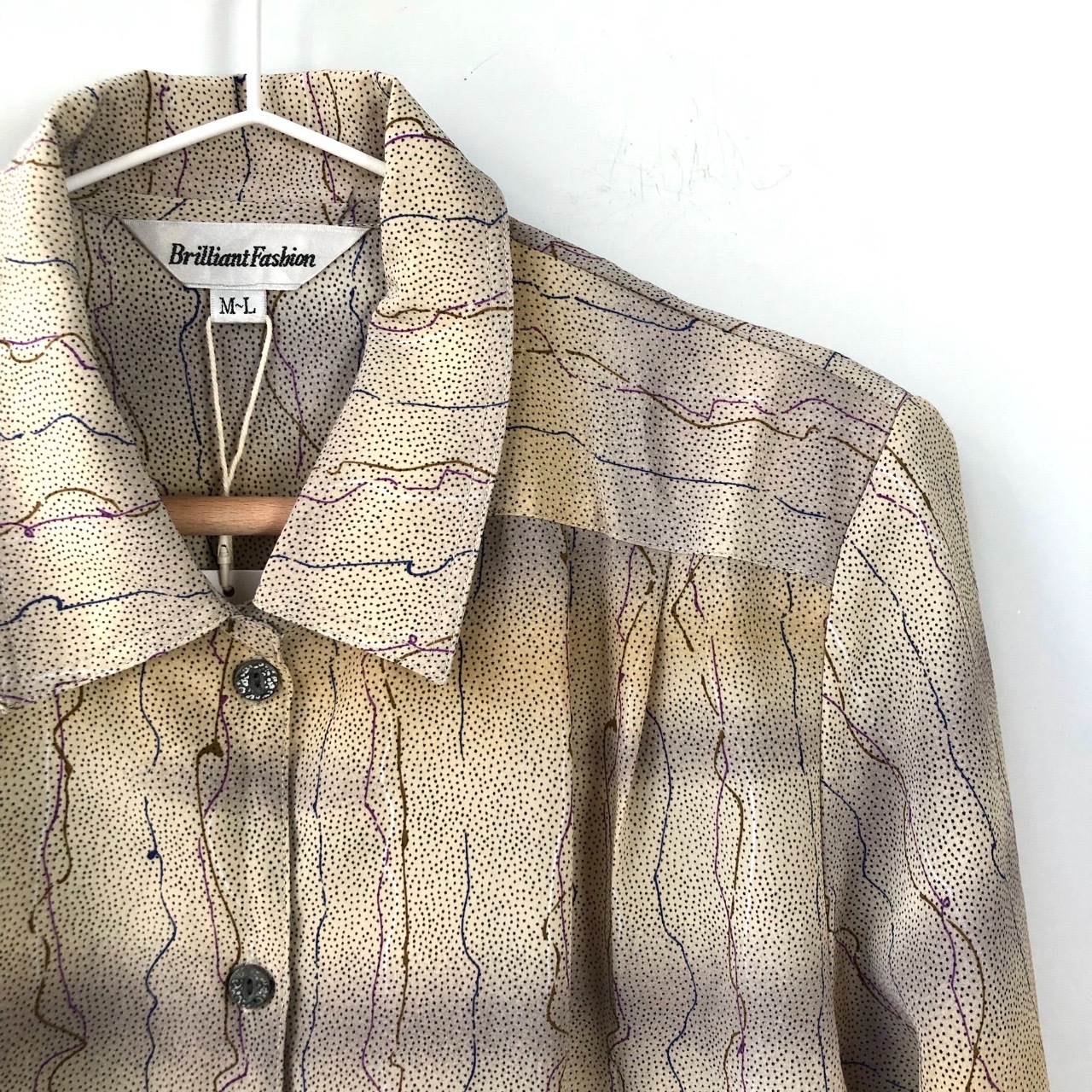 杏色粉刷感線條長袖上衣