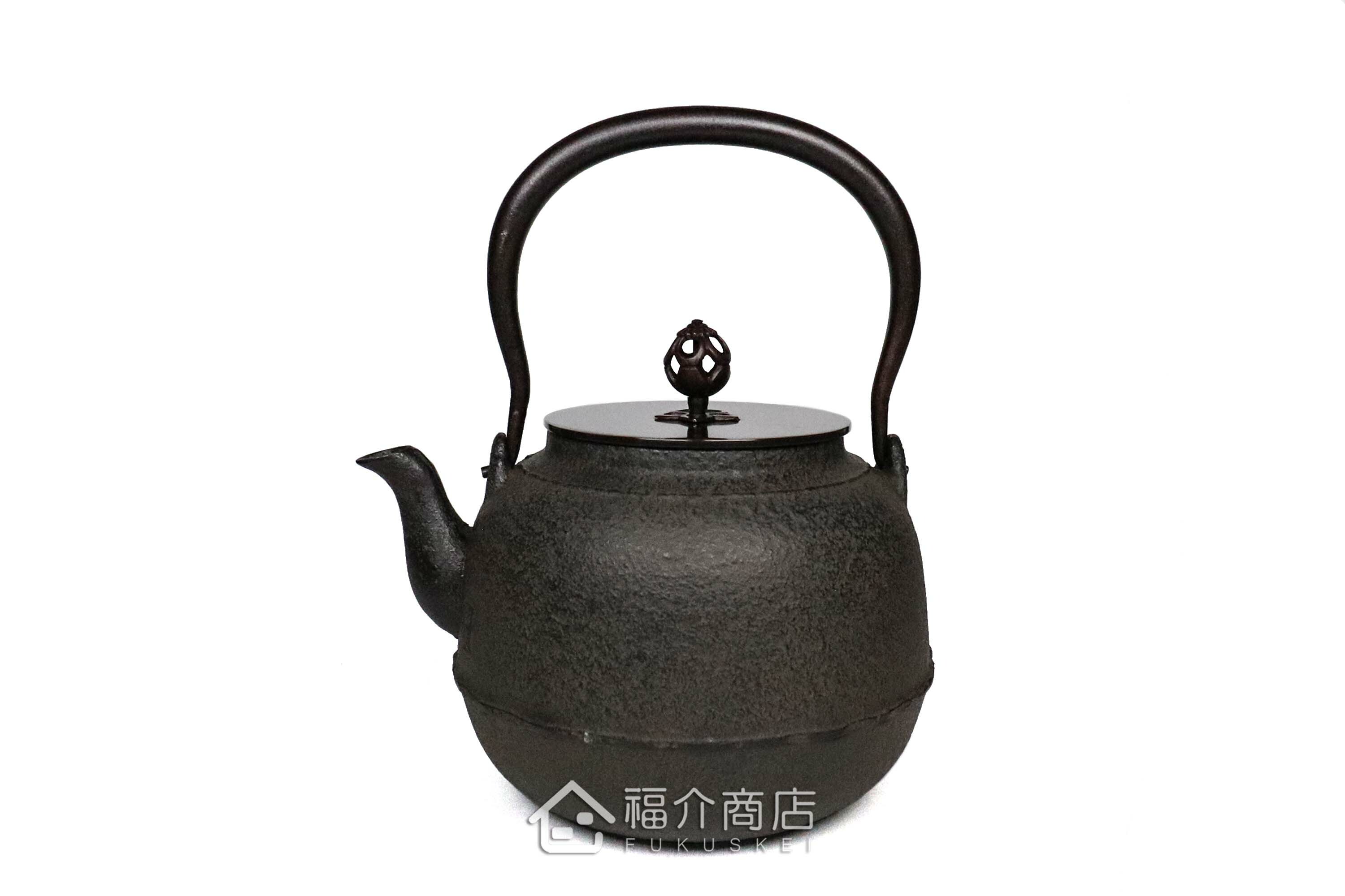 煮水泡茶用的銅蓋鐵壺