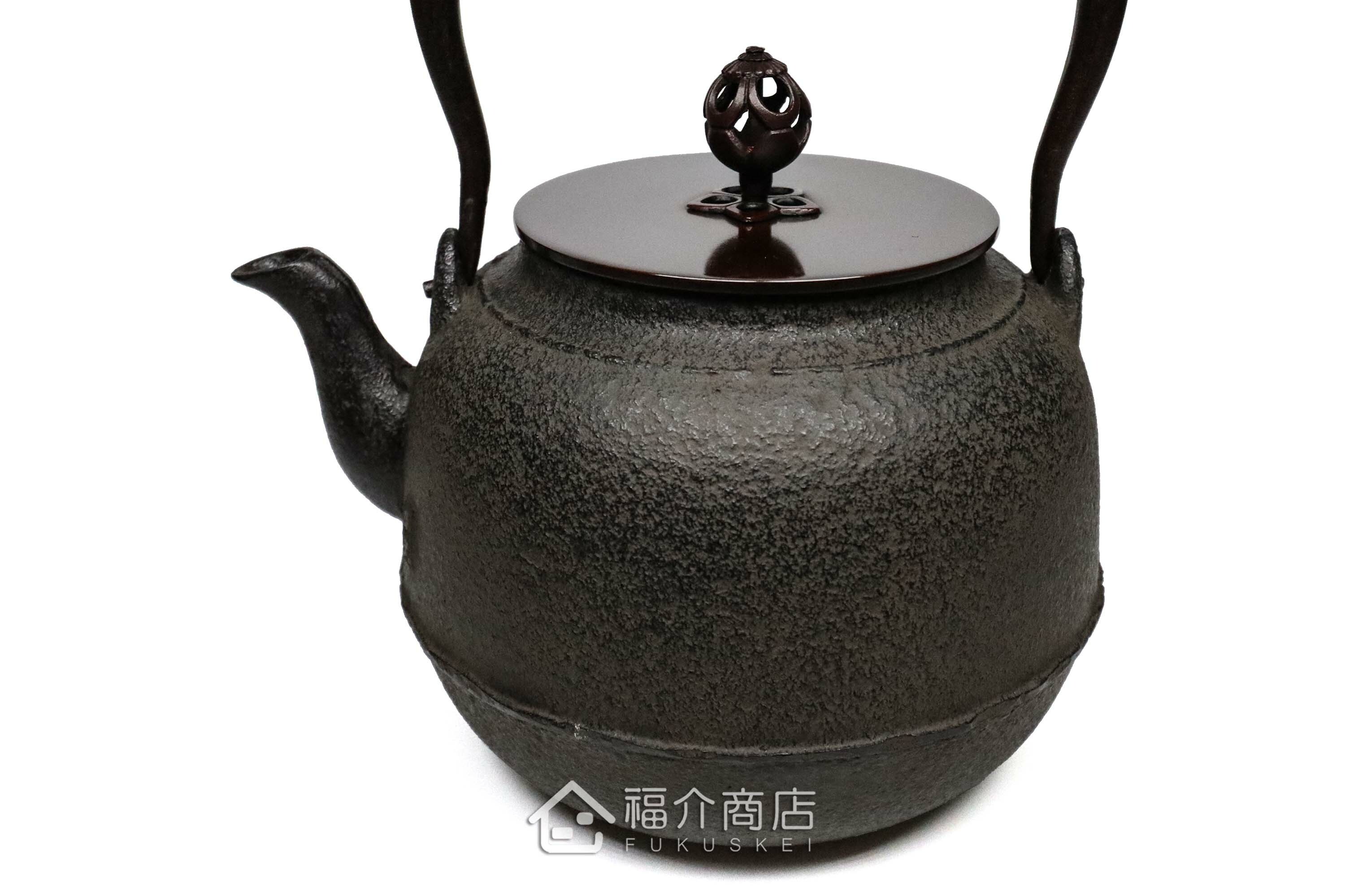 煮水泡茶用的銅蓋鐵壺