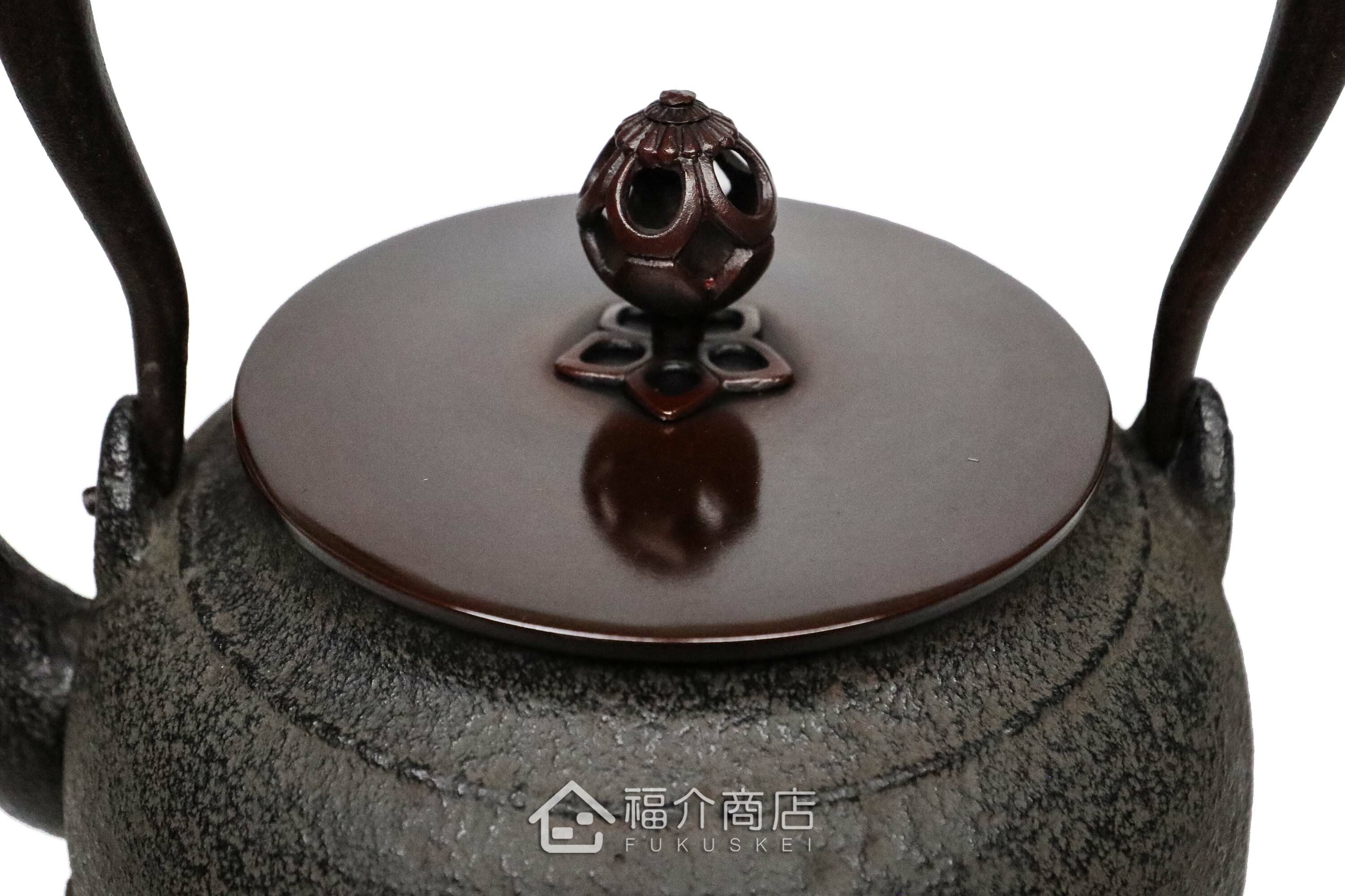煮水泡茶用的銅蓋鐵壺