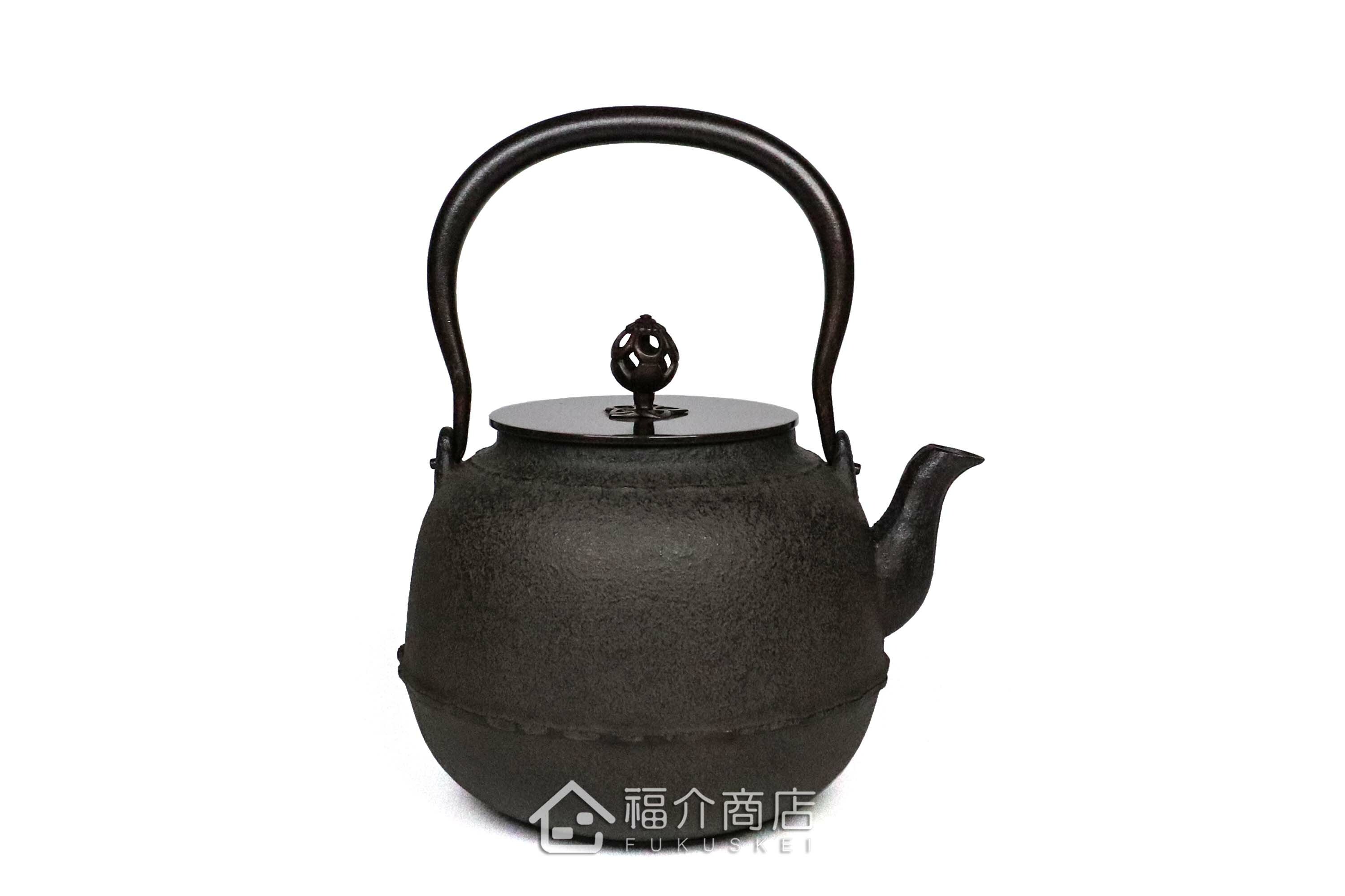 煮水泡茶用的銅蓋鐵壺