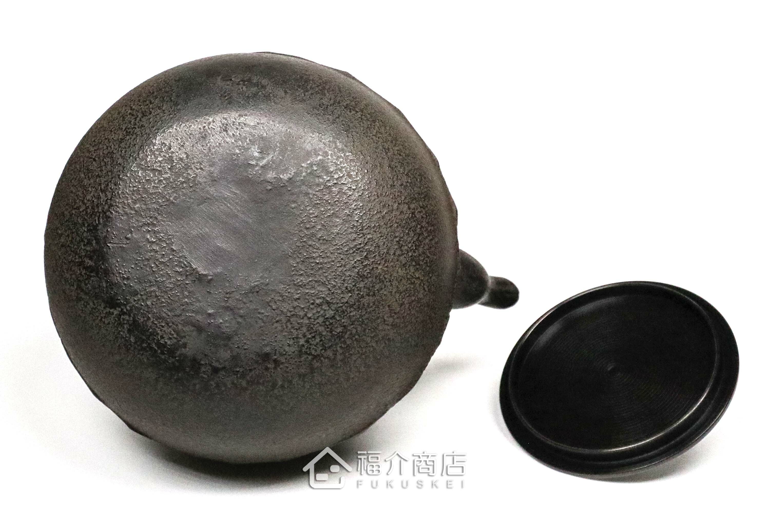 煮水泡茶用的銅蓋鐵壺