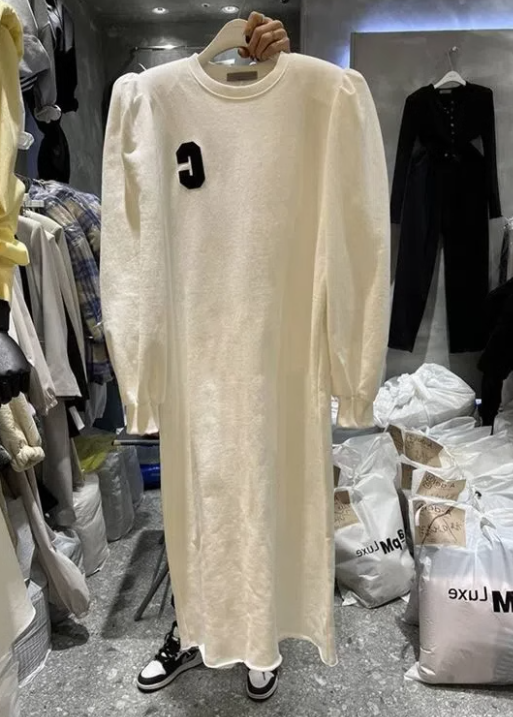 Long sleeved dress with shoulder pads