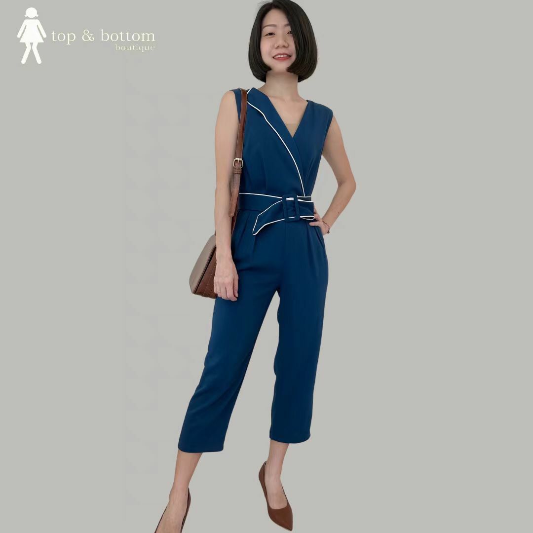 SLEEVELESS VESTED JUMPSUIT