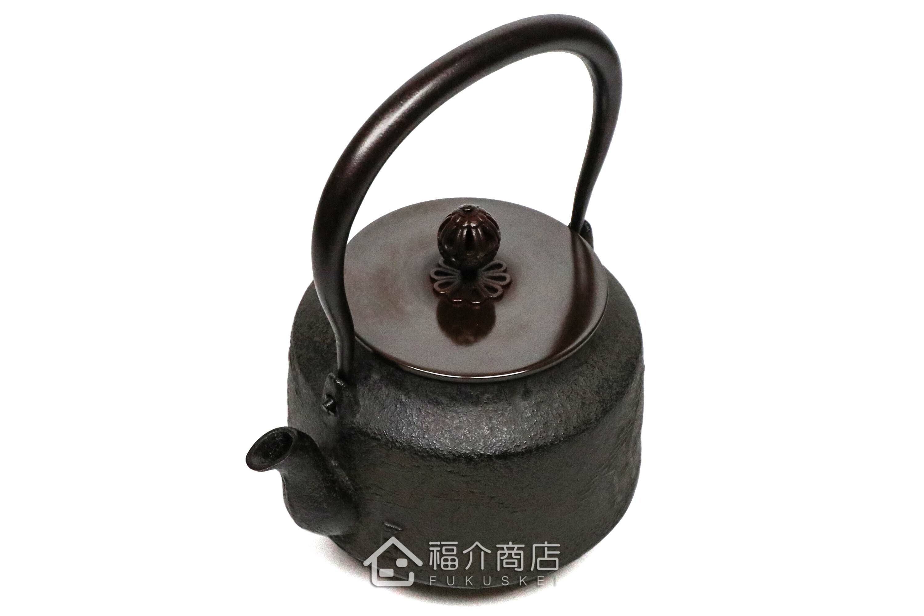 煮水泡茶用的銅蓋松紋鐵壺