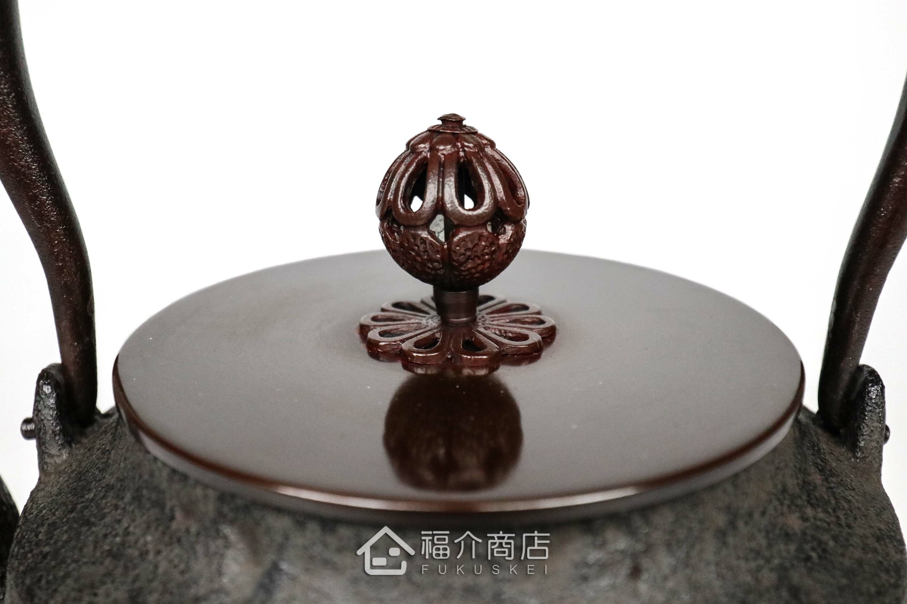 煮水泡茶用的銅蓋松紋鐵壺