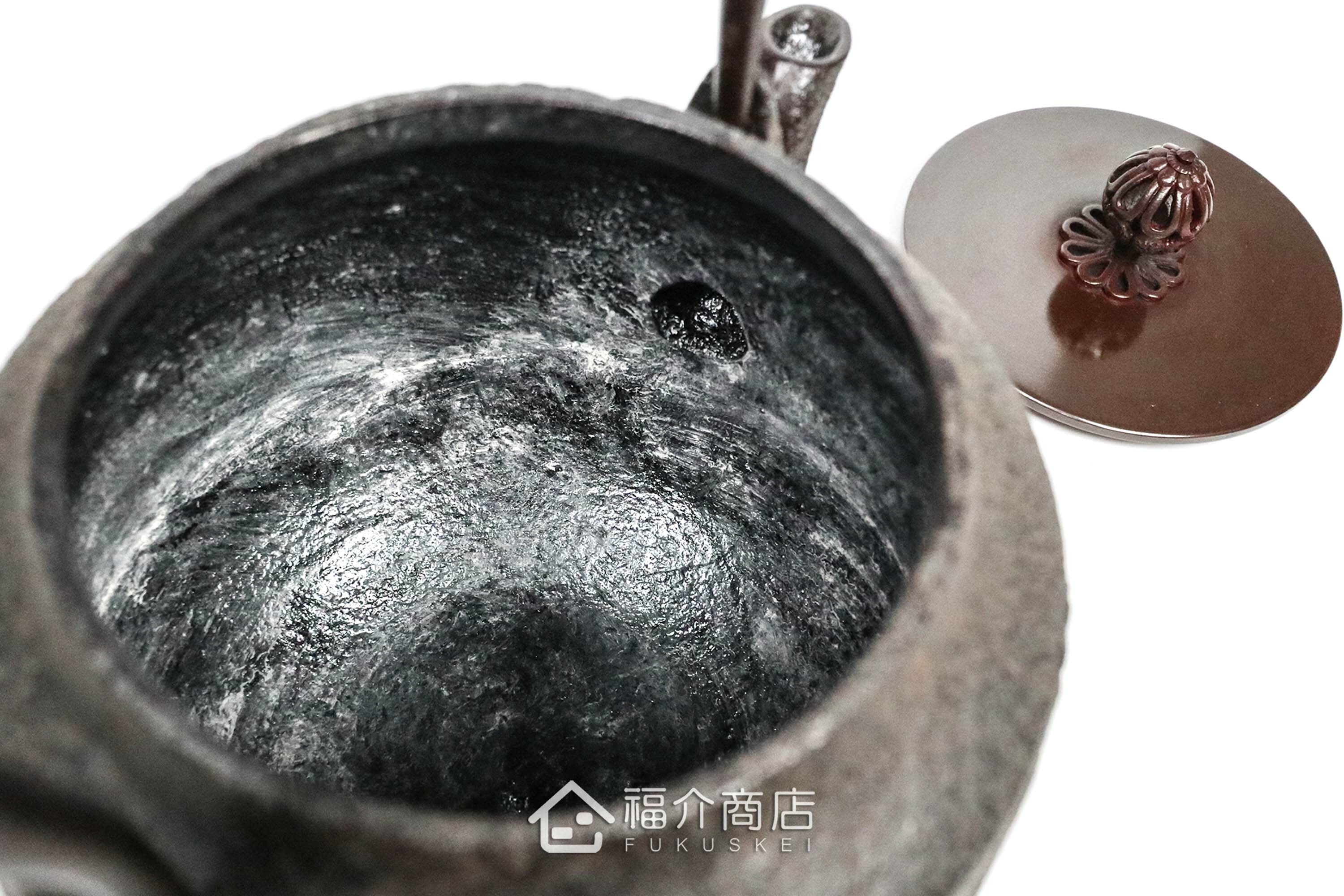 煮水泡茶用的銅蓋松紋鐵壺