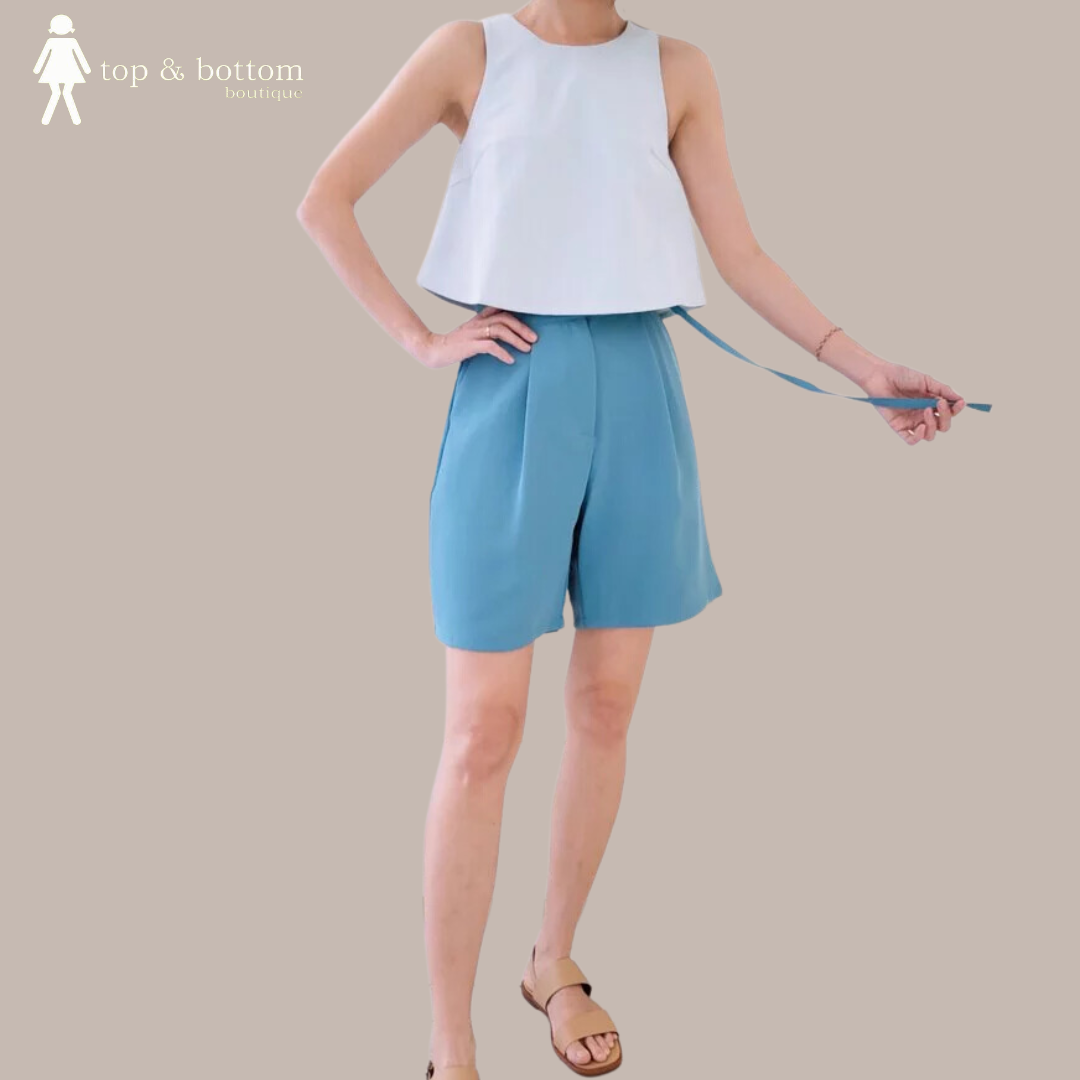 SLEEVELESS FLARE BLOUSE