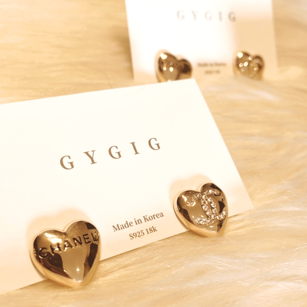 香奶奶 雙c水鑽不對稱金桃心翻玩耳釘