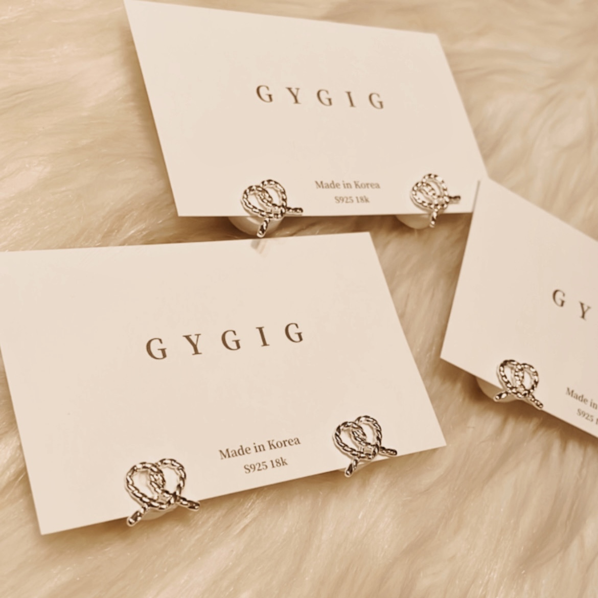 銀麻花心小耳釘