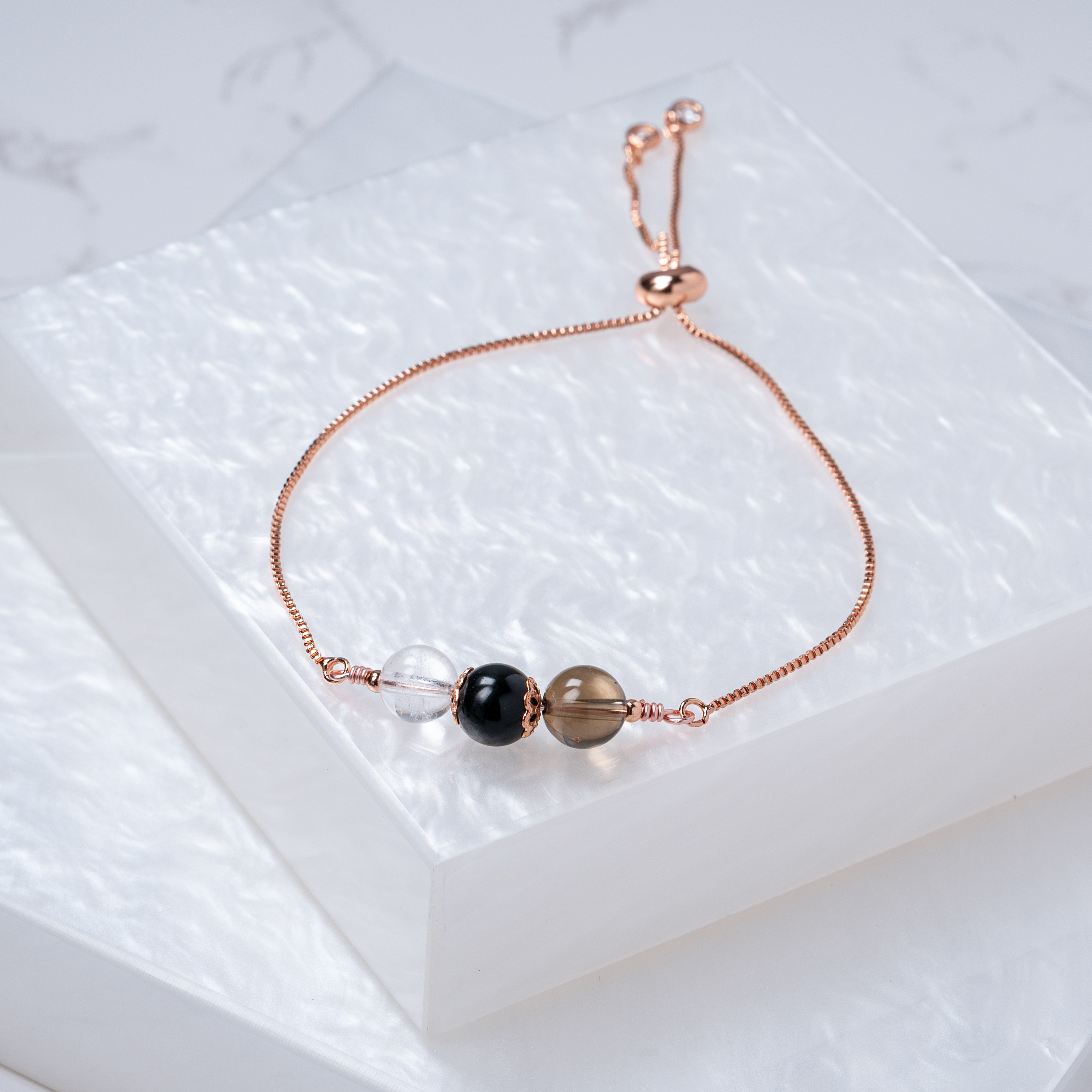 【白水晶﹒黑曜石﹒茶晶】拉式手鍊