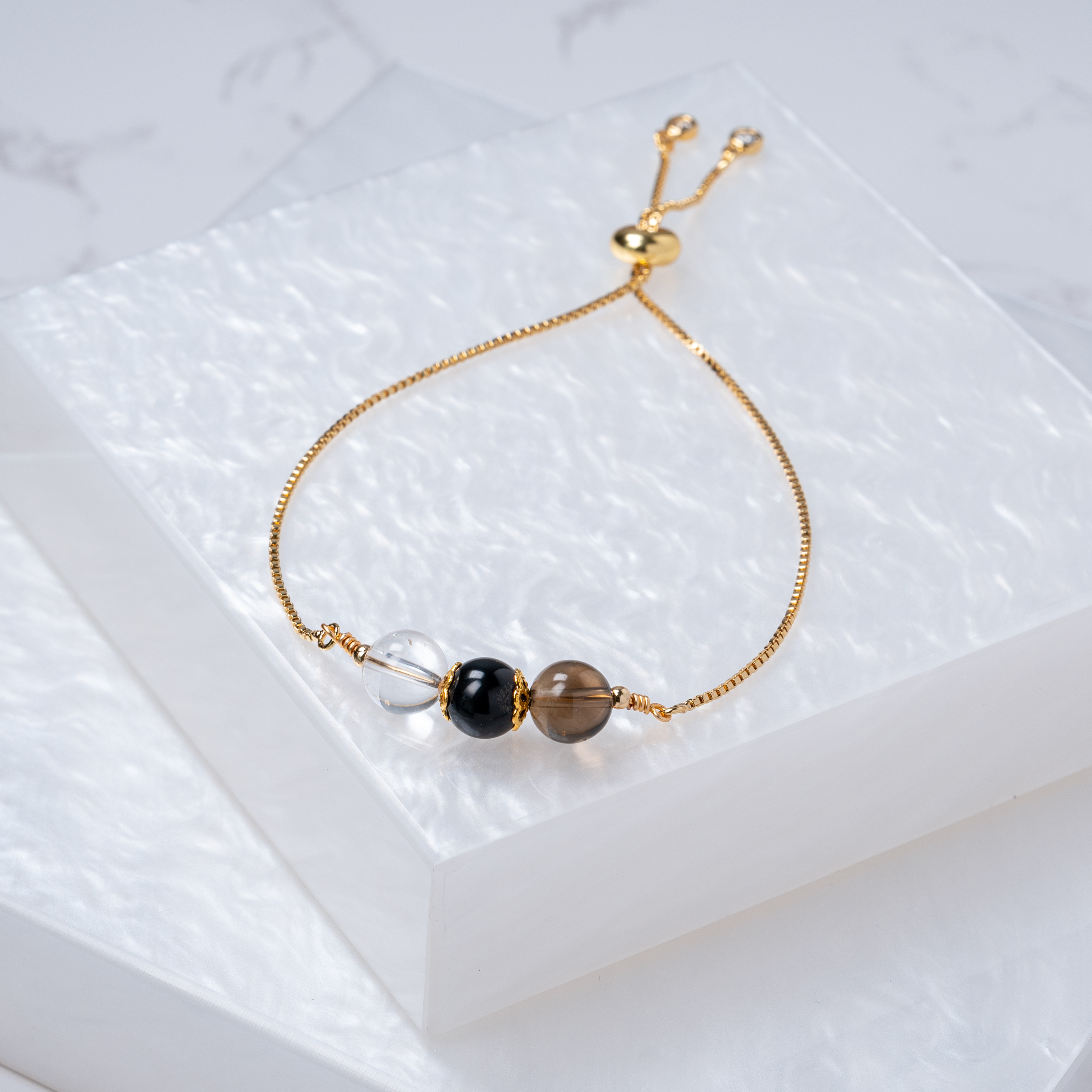 【白水晶﹒黑曜石﹒茶晶】拉式手鍊