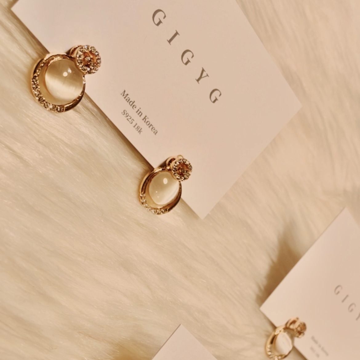 G英字白金鑽貓眼墜耳釘