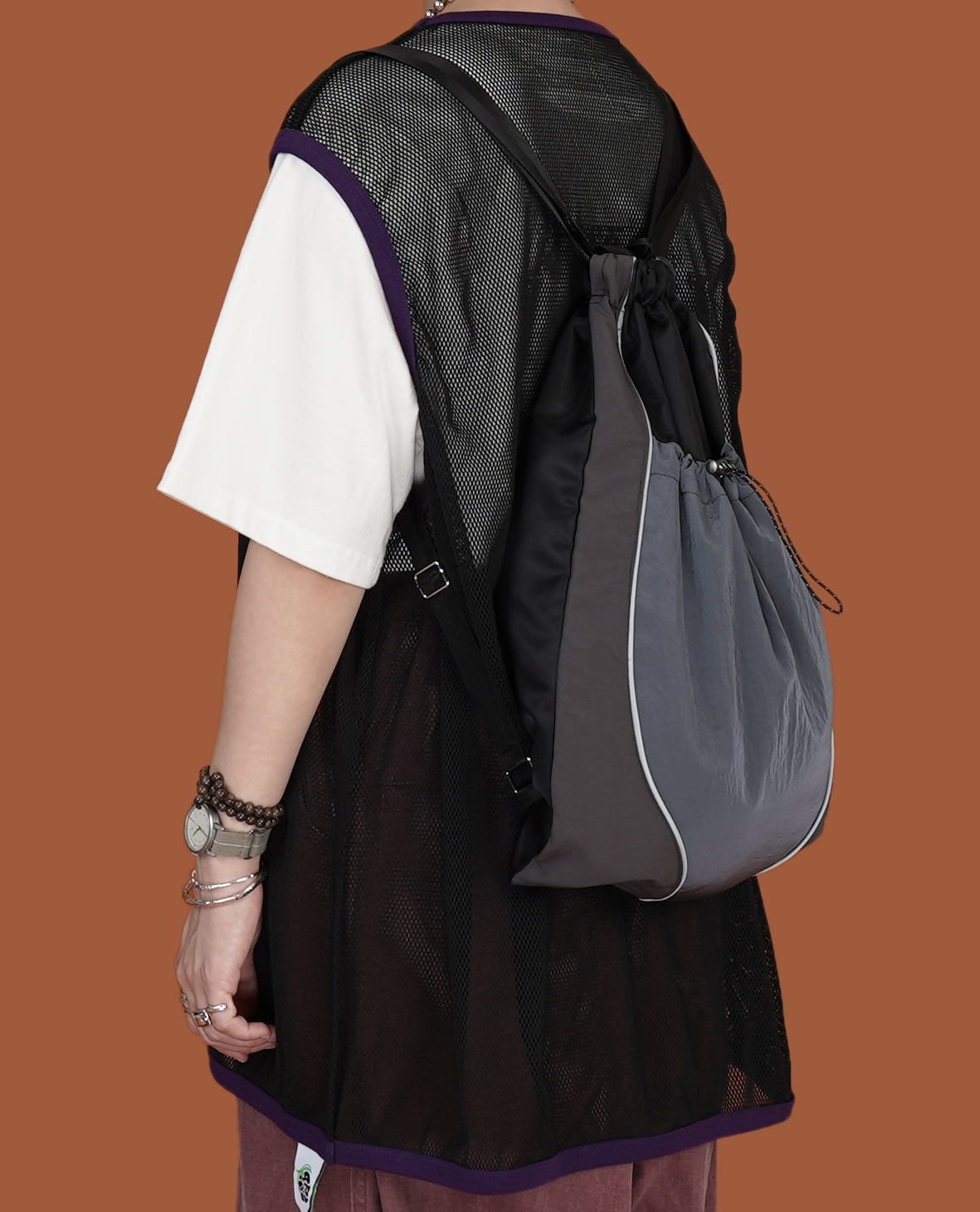 滑料縮口反光壓條背包