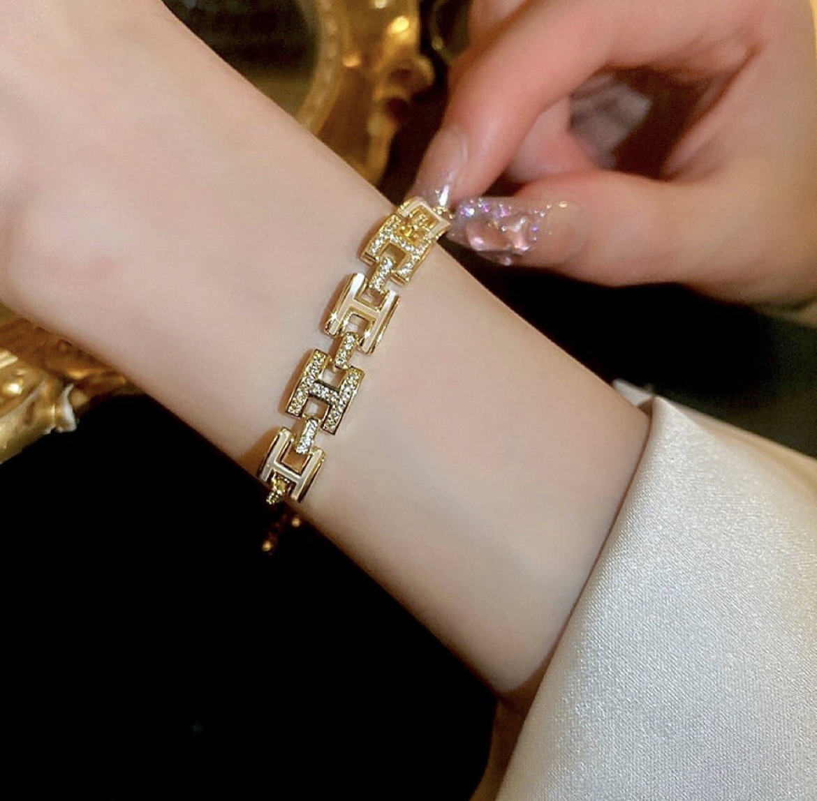 H晶透白玉貝 橫金珠抽拉手鍊