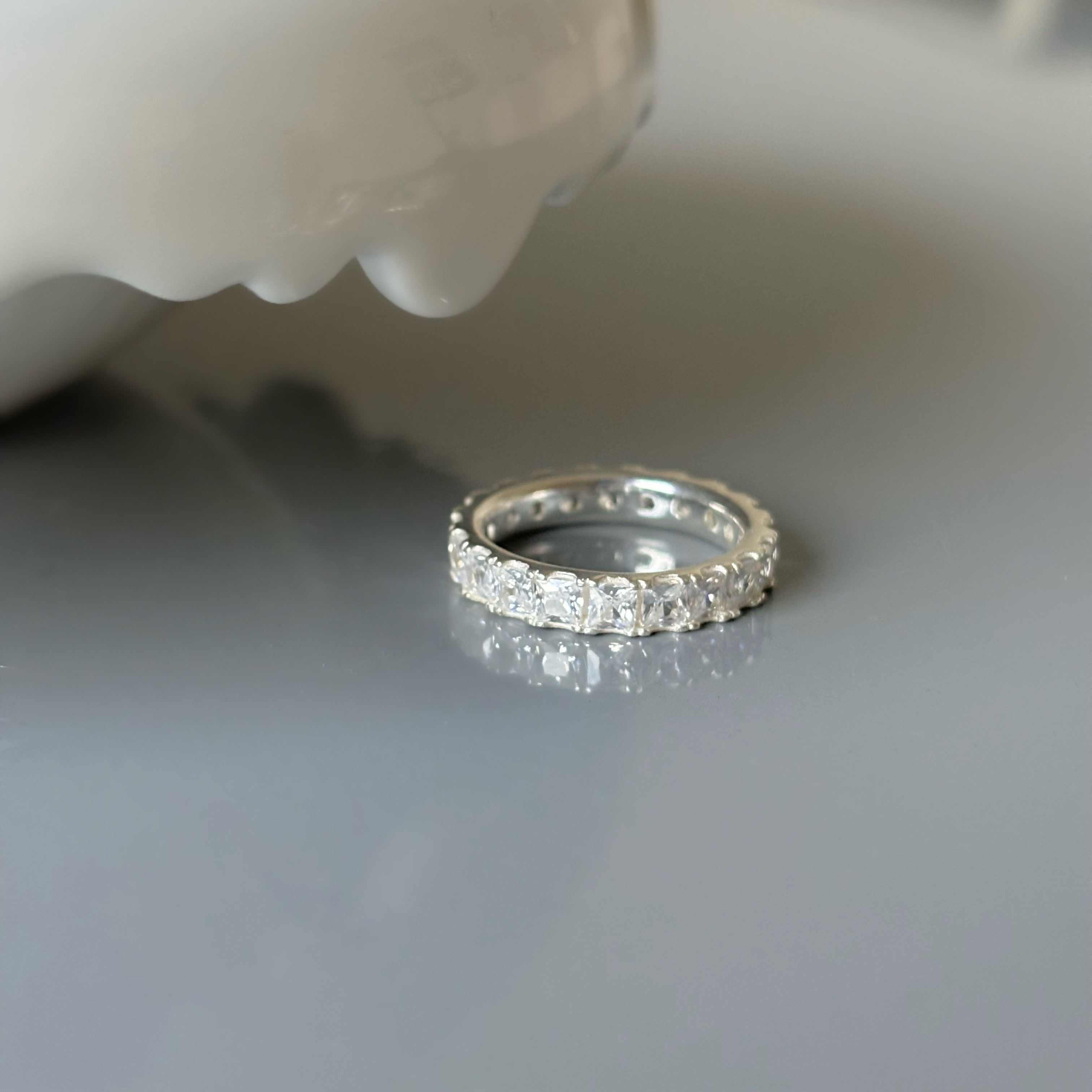 Princess zircon band ring