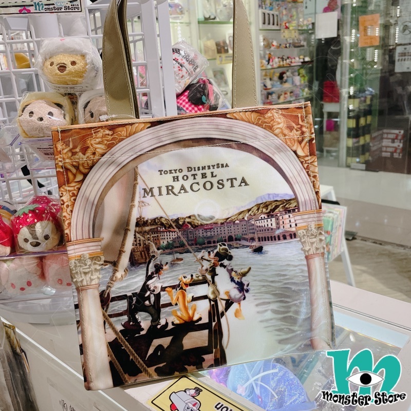 米奇與朋友手挽袋