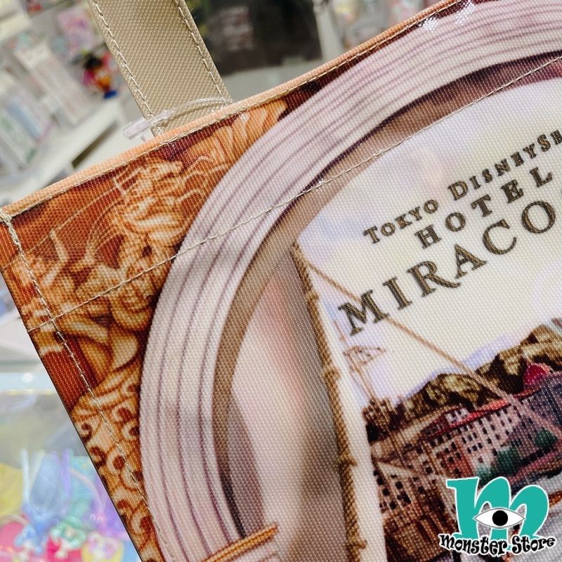 米奇與朋友手挽袋