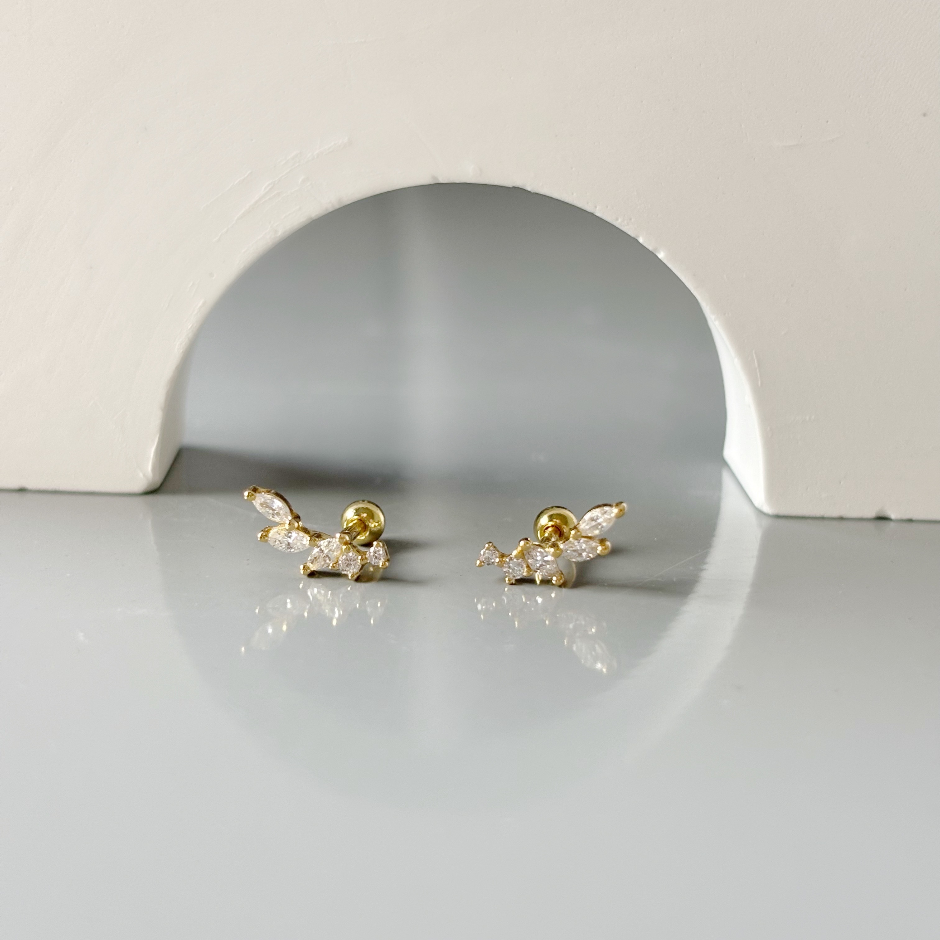 Leaves zircon piercing