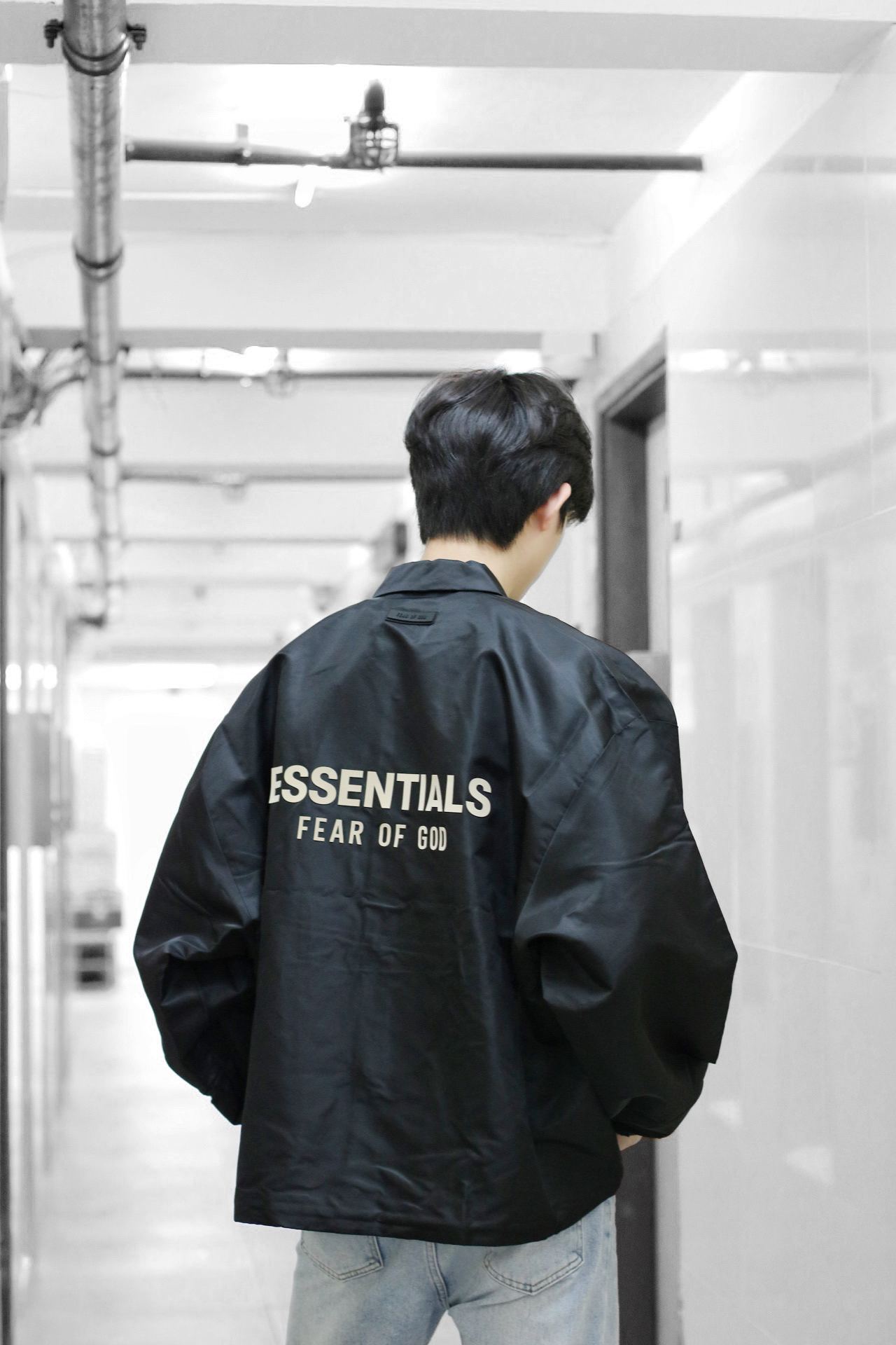 Fear of God Essentials FW23 Coach Jacket  Jet Black