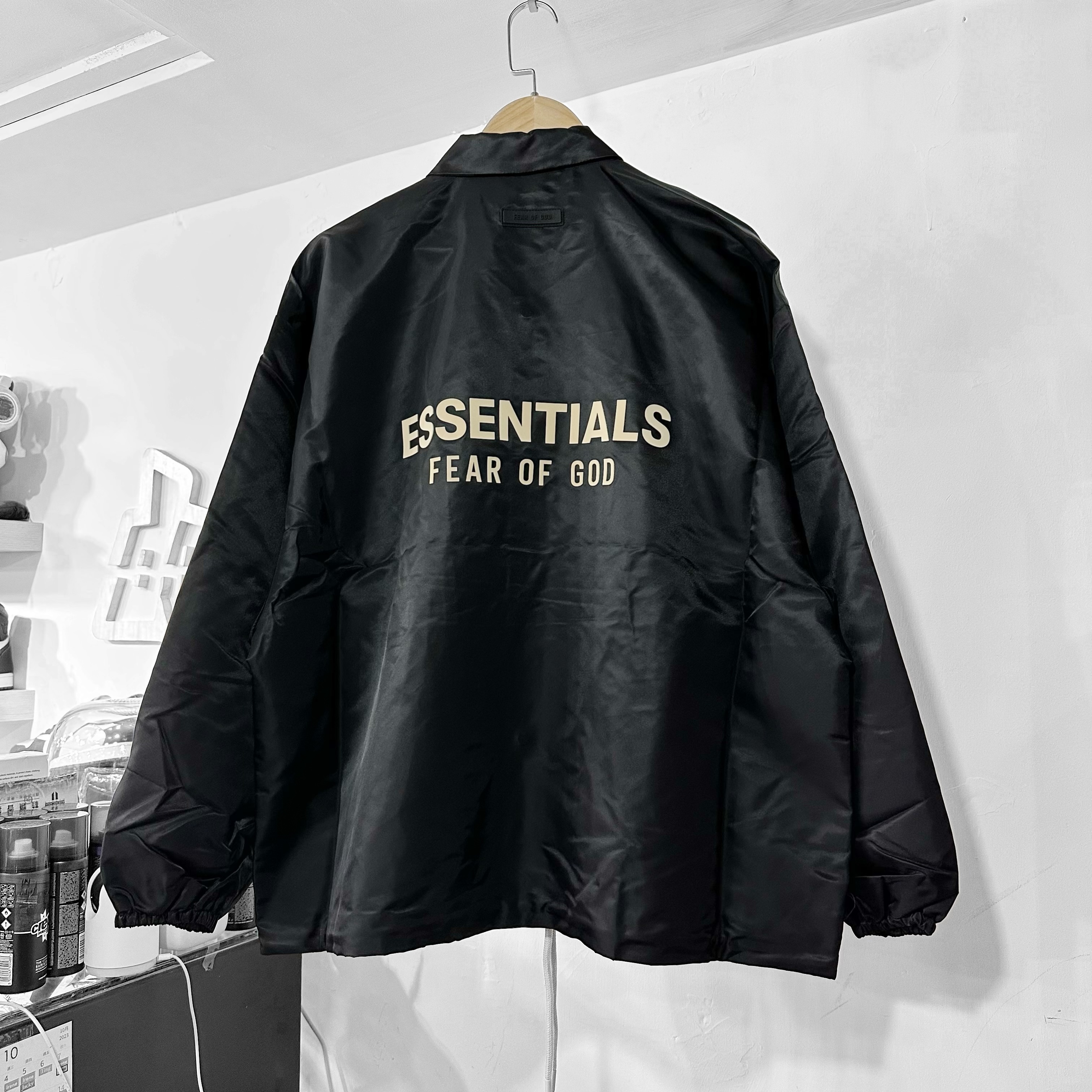 Fear of God Essentials FW23 Coach Jacket  Jet Black