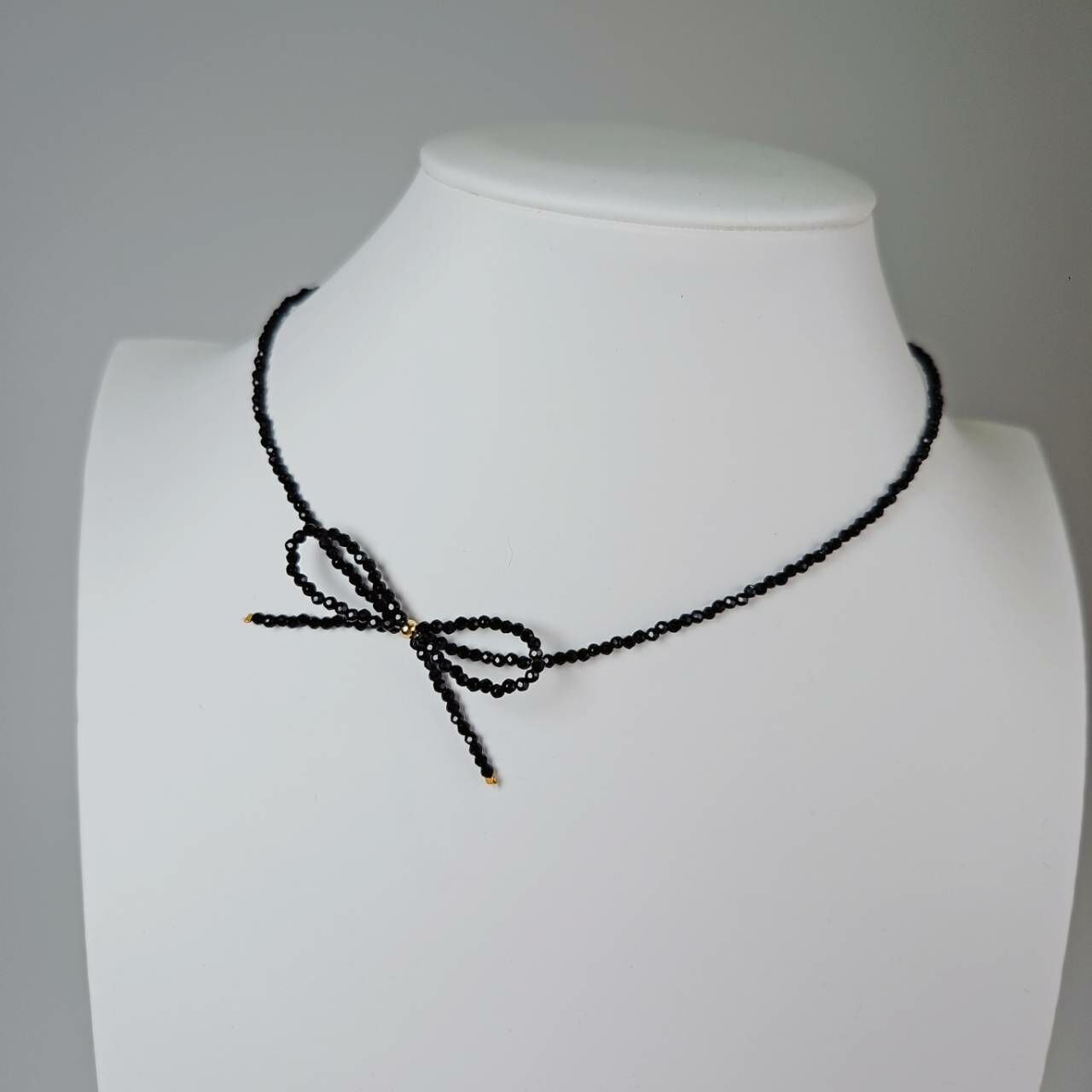 蝴蝶結黑尖晶石項鍊