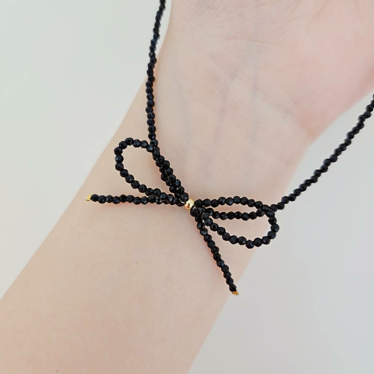 蝴蝶結黑尖晶石項鍊