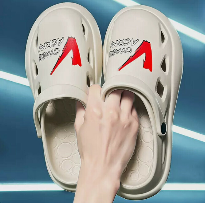 In the sand beach, he wears cool shoes with a hole in the head